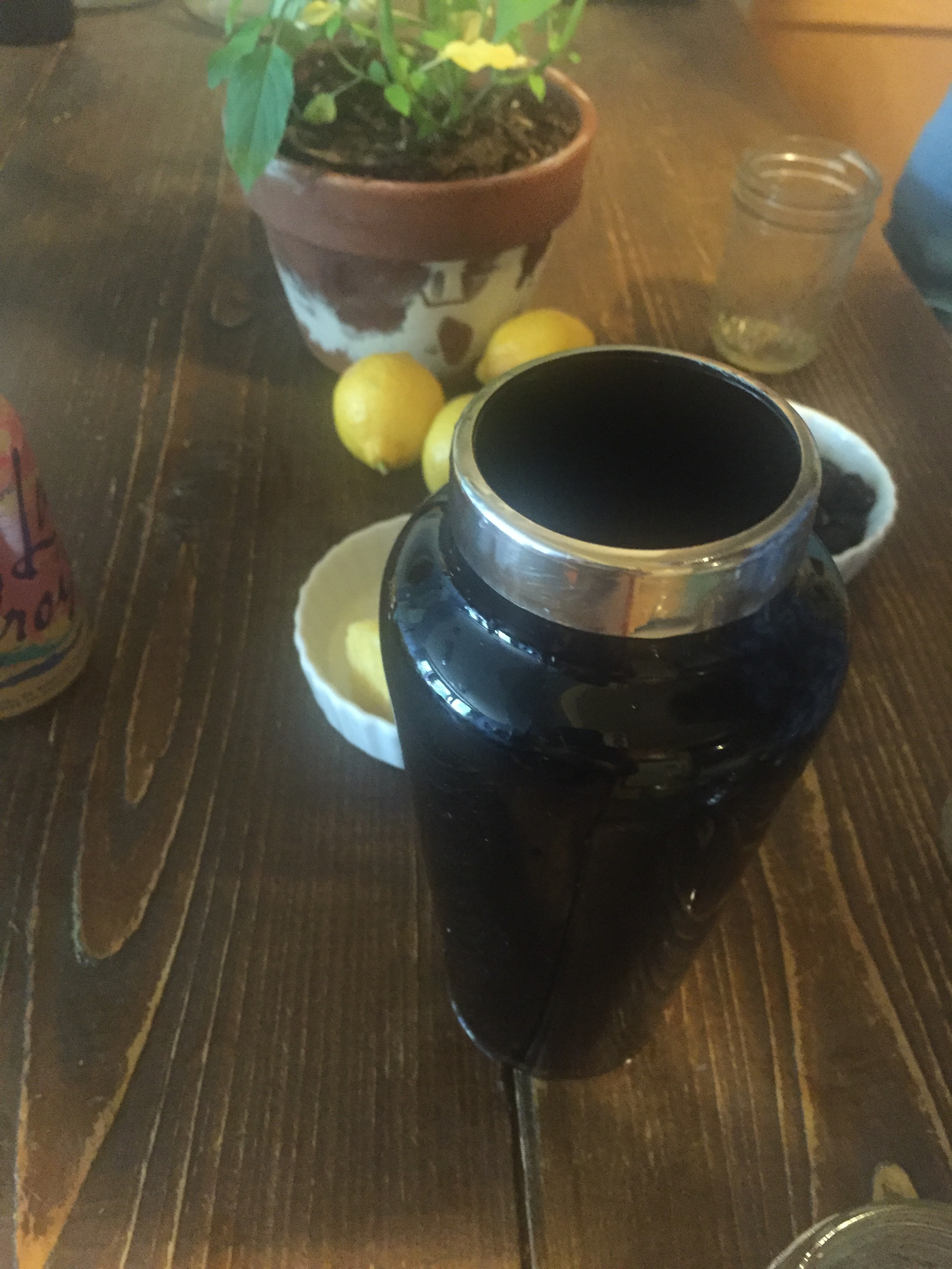 Add fresh lemon juice, gin and ice.