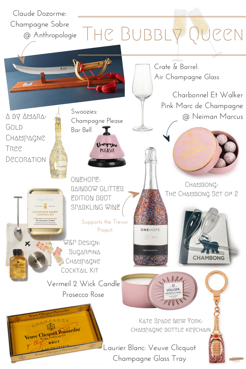 Gold Champagne Tree Decoration $17 Vermeil 2 Wick Candle Prosecco Rose $33 Claude Dozorme Champagne Sabre $598.00 The Chambong Set of 2 $35.00 Veuve Clicquot Champagne Glass Tray $124.00 W&P Design Sugarfina Champagne Cocktail Kit $25.00 Swoozies Champagne Please Bar Bell $12.95 Kate Spade New York Champagne Bottle Keychain $68.00 ONEHOPE Rainbow Glitter Edition Brut Sparkling Wine $59.00 Crate & Barrel Air Champagne Glass $17.95 Charbonnel Et Walker Pink Marc de Champagne Truffles $28.00