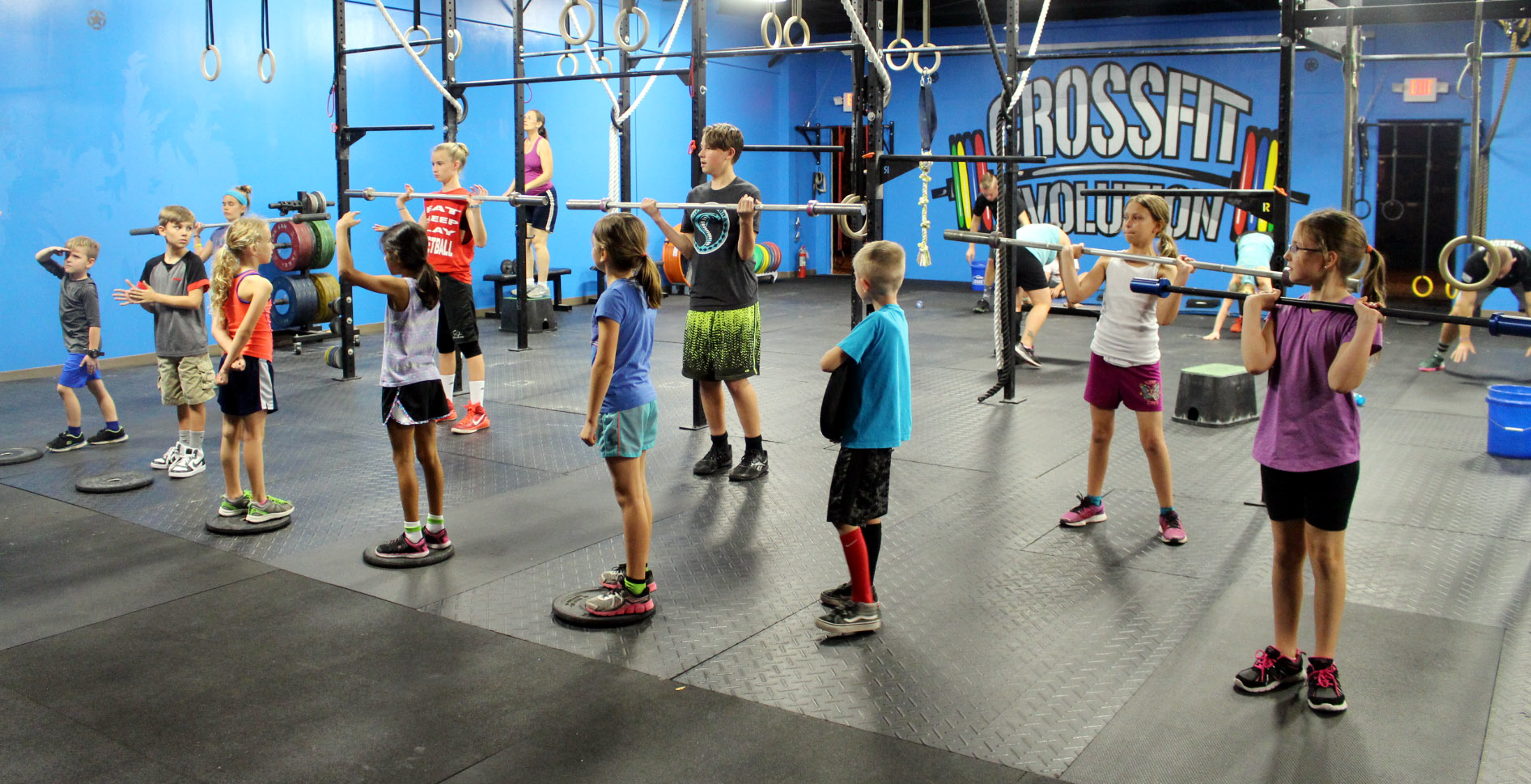 Older kids group getting ready to workout.