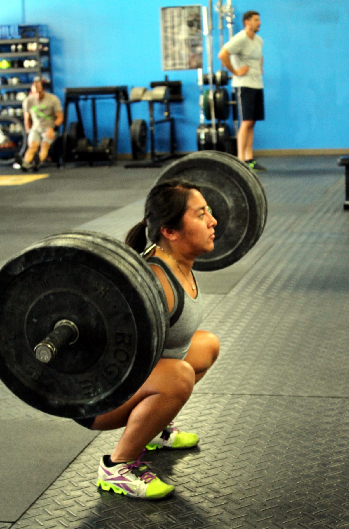 Joy back squatting