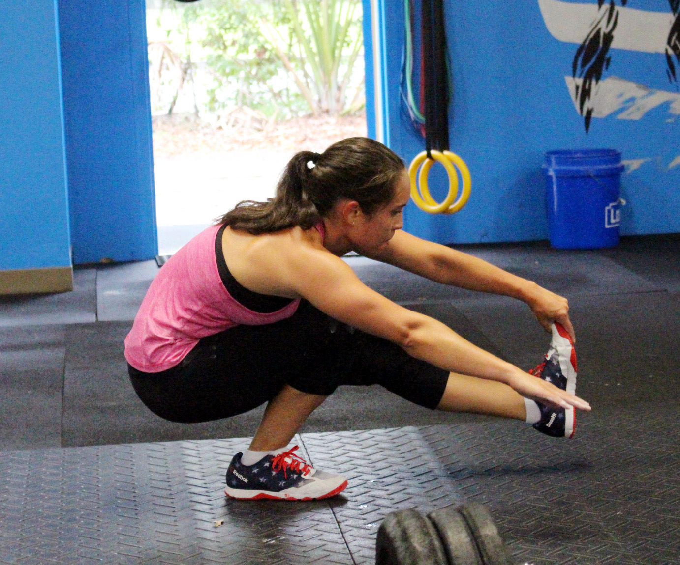 Janna doing a "Pistol" (single legged squat)