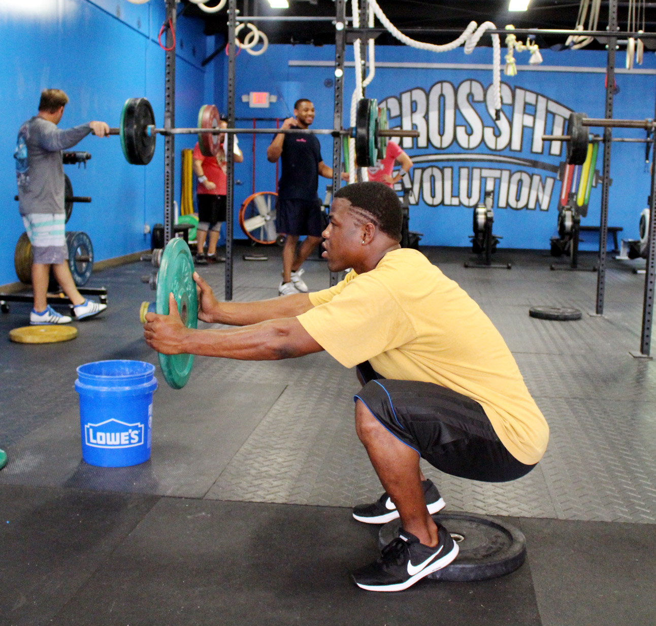 Alphonso working on squat flexibility