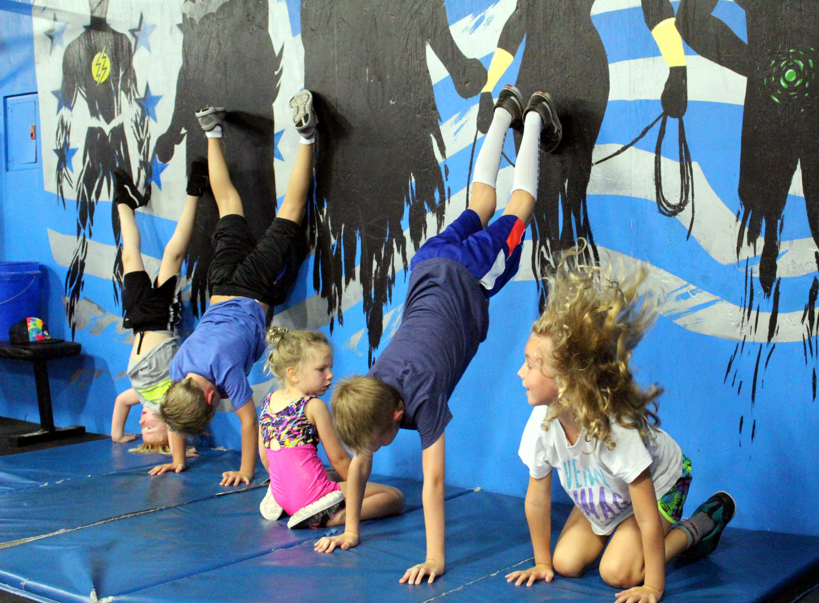Kids practicing Handstands & Headstands