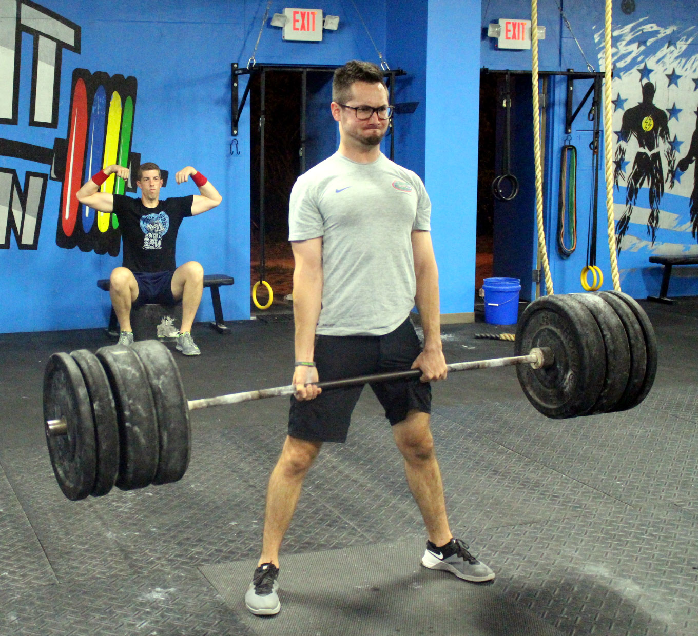 Justin deadlifting & Eric flexin'