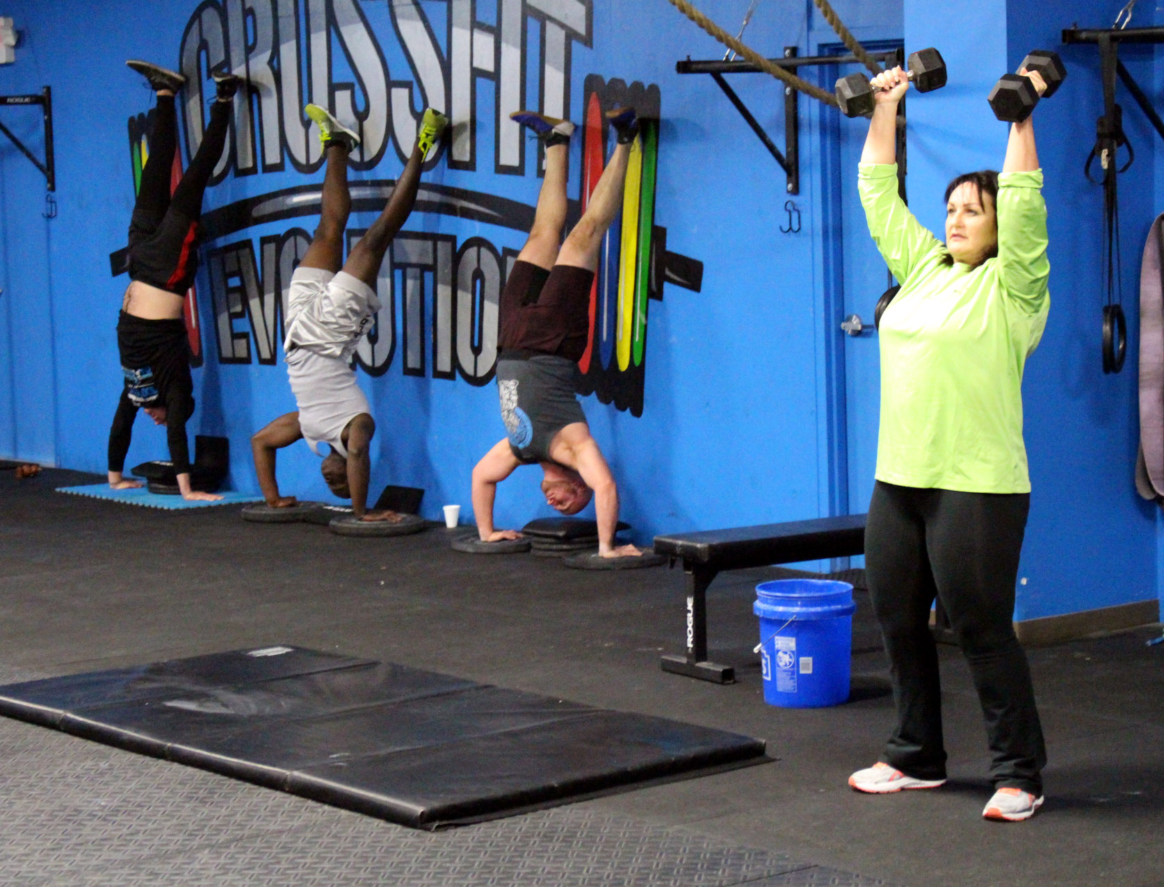 Shoulder Presses are a great beginner exercise instead of Handstand Push-ups