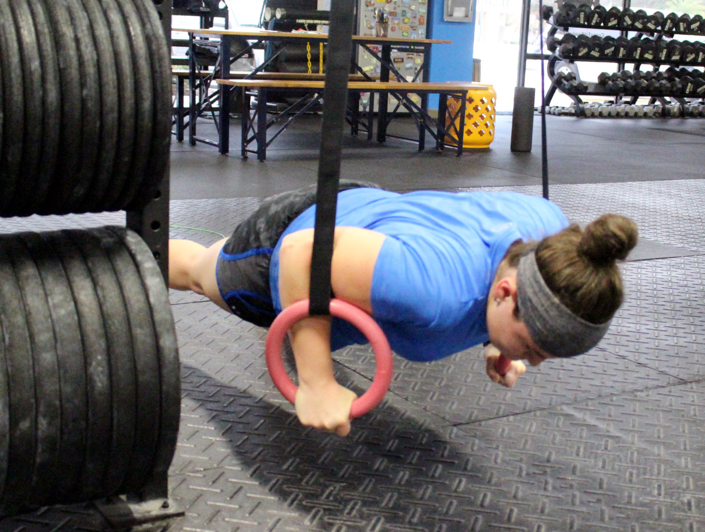 Kayla doing Ring Push-ups