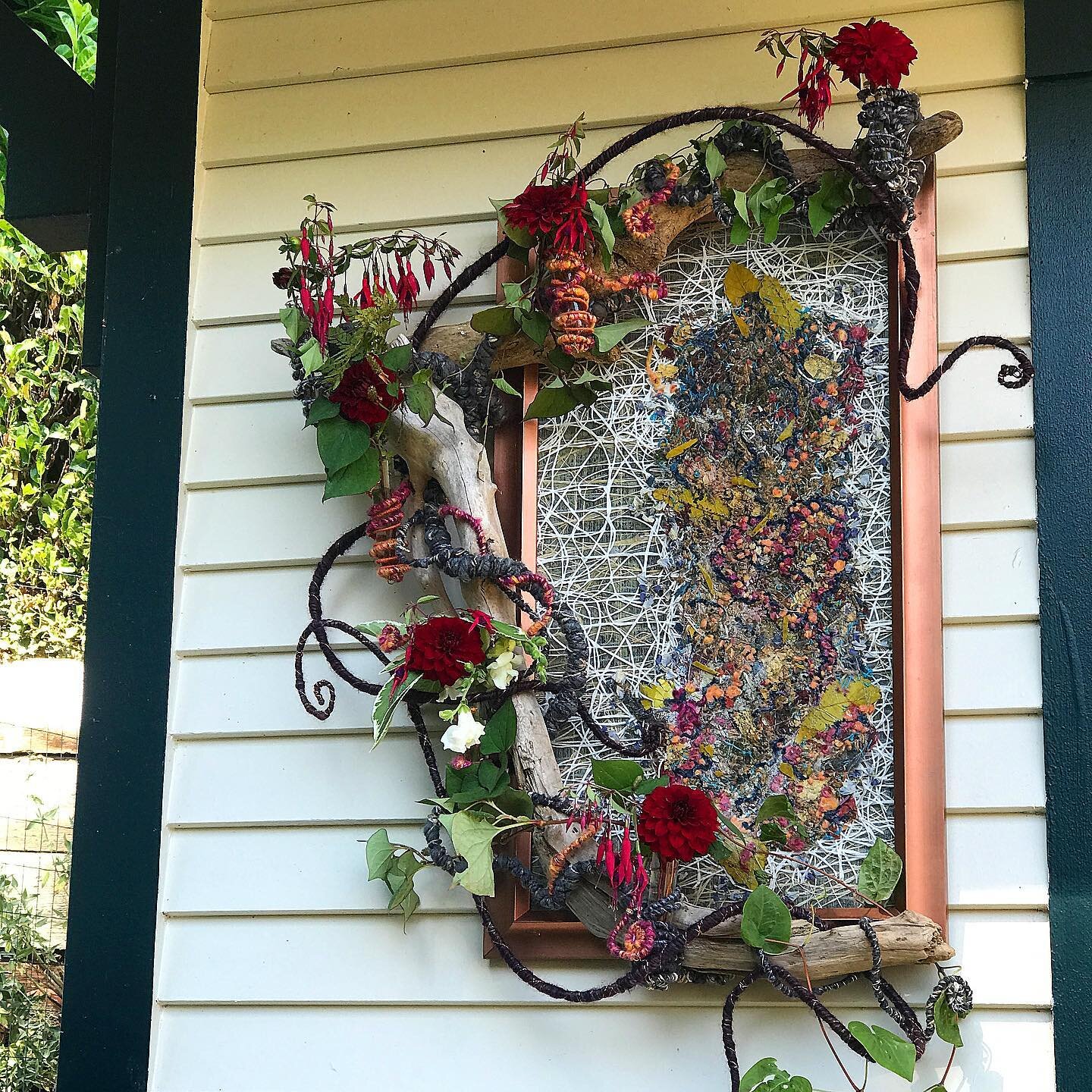 I couldn&rsquo;t find a place to store this framed Botanical Tapestry so I hung it outside my studio and tossed in a few stray flowers . It takes nothing to fancy up. Kind of fun how it is ever changing. 
This winter I&rsquo;ll be working on more Bot