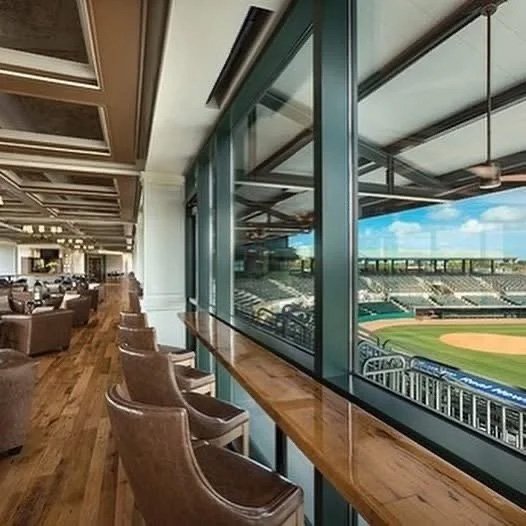 elegant-viewing-area-in-a-sports-venue-with-wooden-flooring.jpg