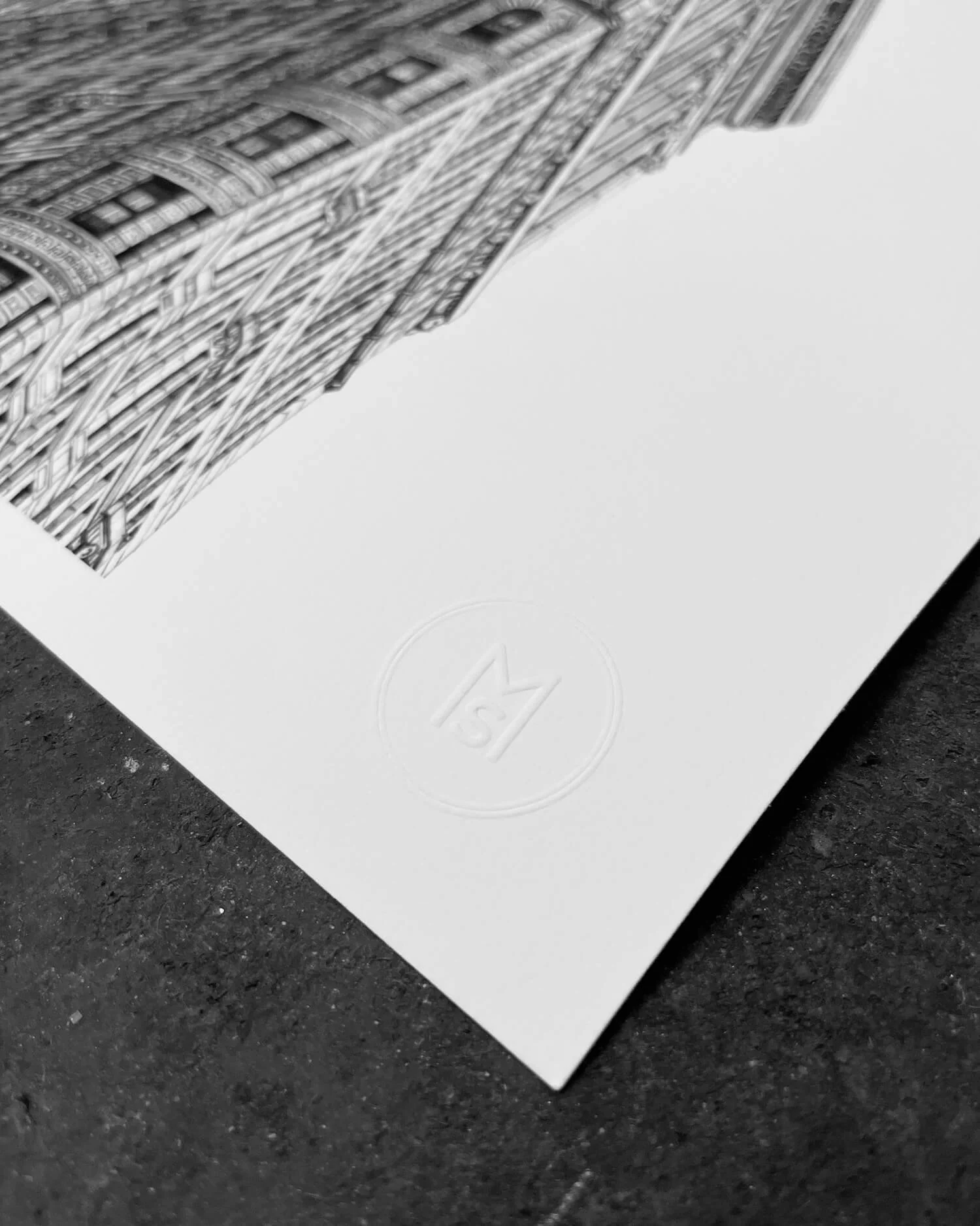 Embossed logo on architectural print