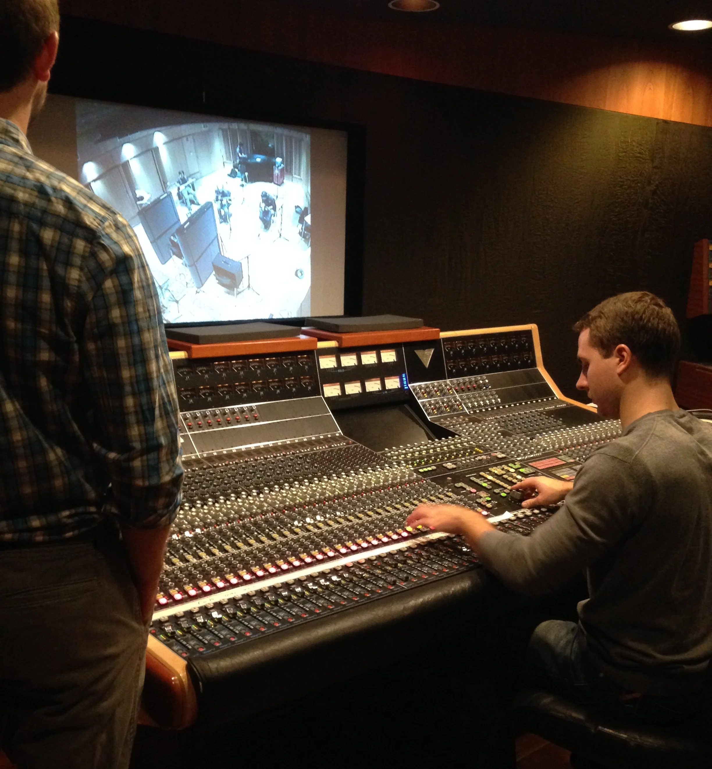 Ethan King and Sean Patterson tracking P-Zap in UML's main control room, 2015.