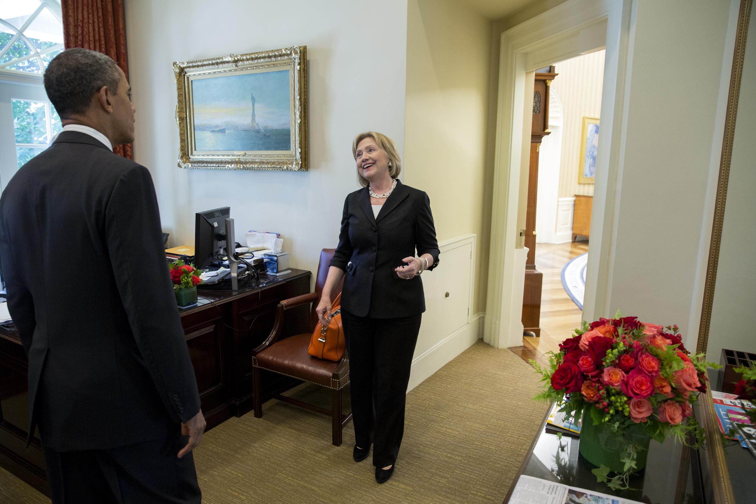 President Obama greets former Secretary of State Hillary Rodham Clinton in the Outer Oval Office. 2013.