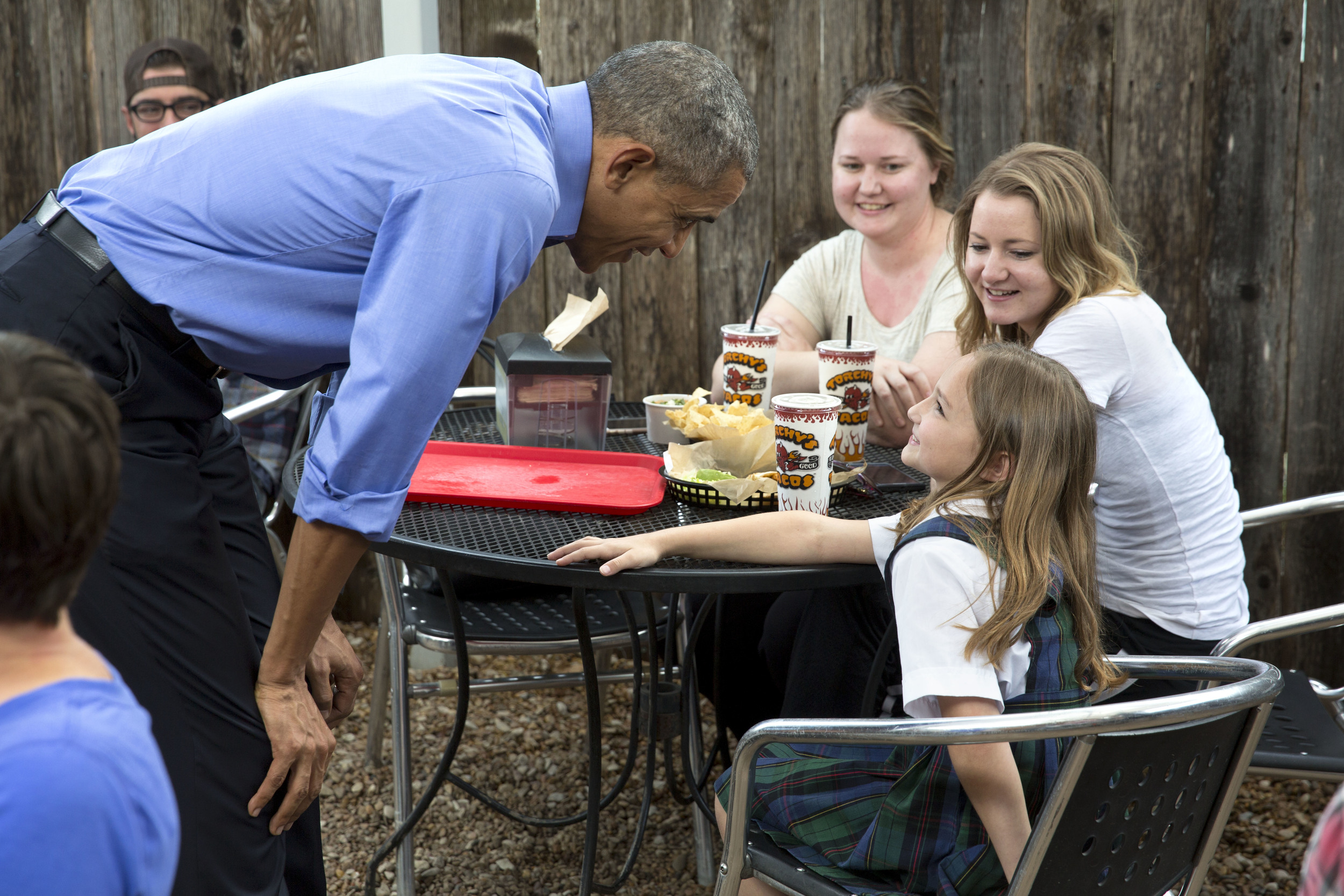 President Barack Obama talks to a young diner at Torchy’s Tacos in Austin, Tx. - 2016