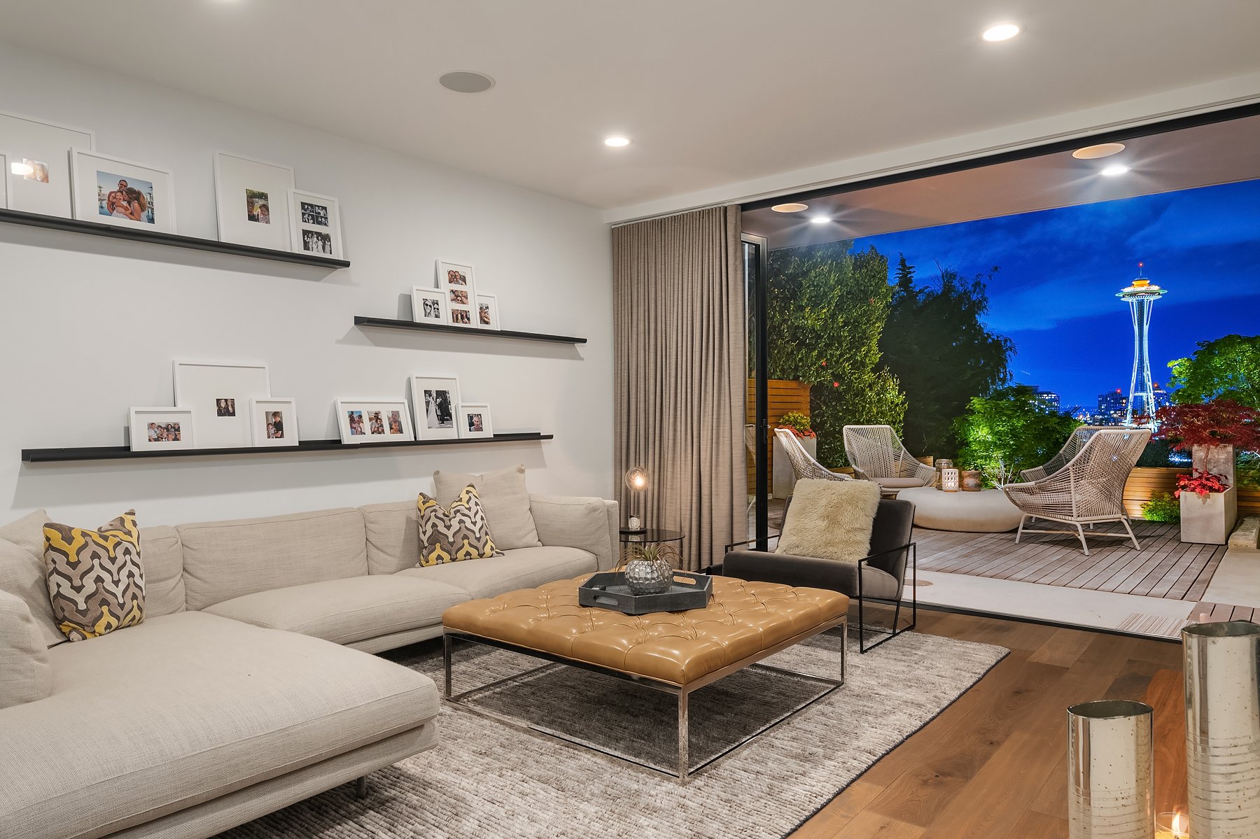  Who has ever had a lower-level family room with this kind of view.?! UNBELIEVABLE! There is a gas fireplace on the opposite wall. 