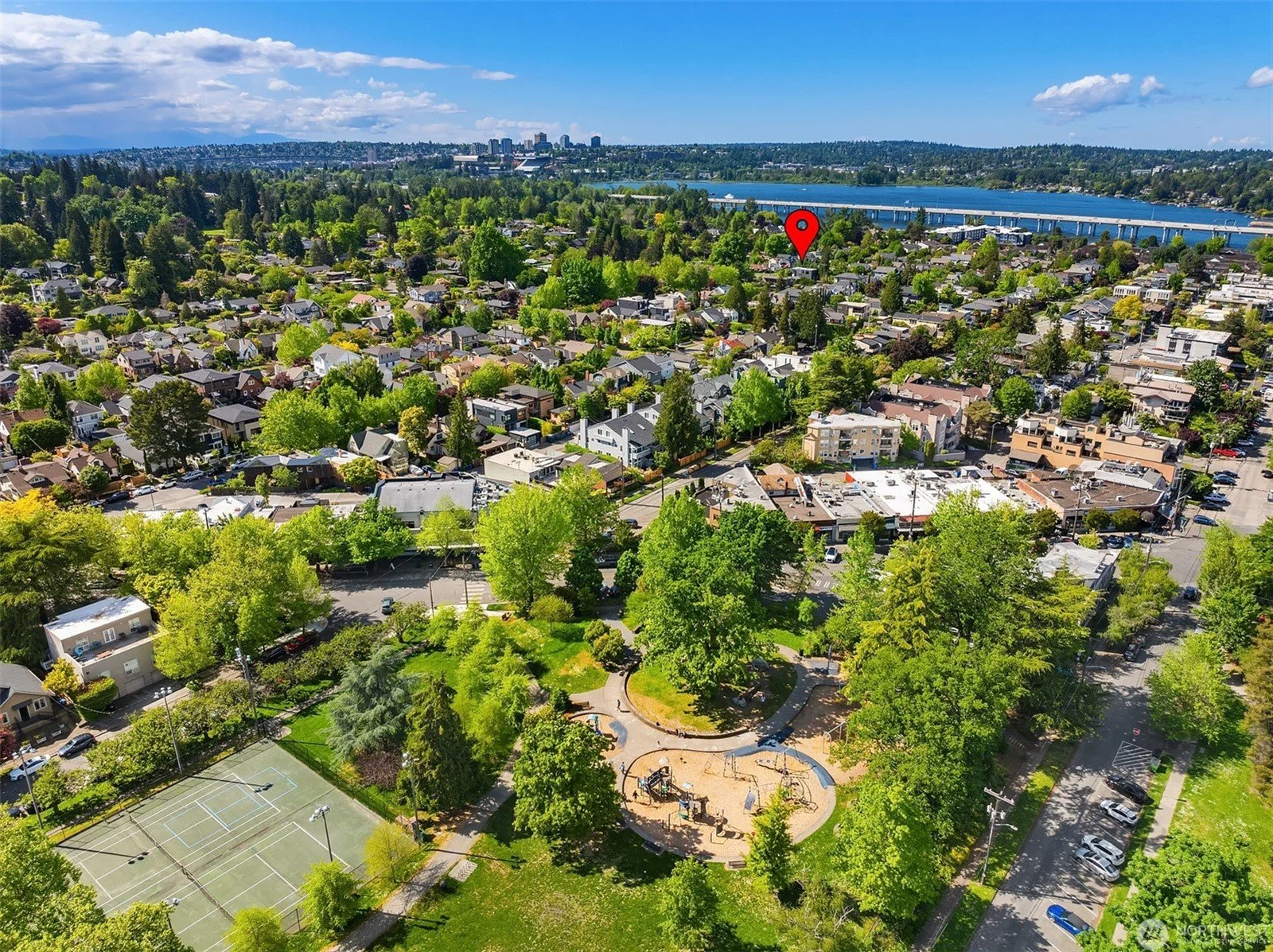  Located just 2 blocks from the charming village of Madison Park with its eclectic array of watering holes, boutiques and eateries, the community park &amp; tennis courts, and of course Lake Washington! 