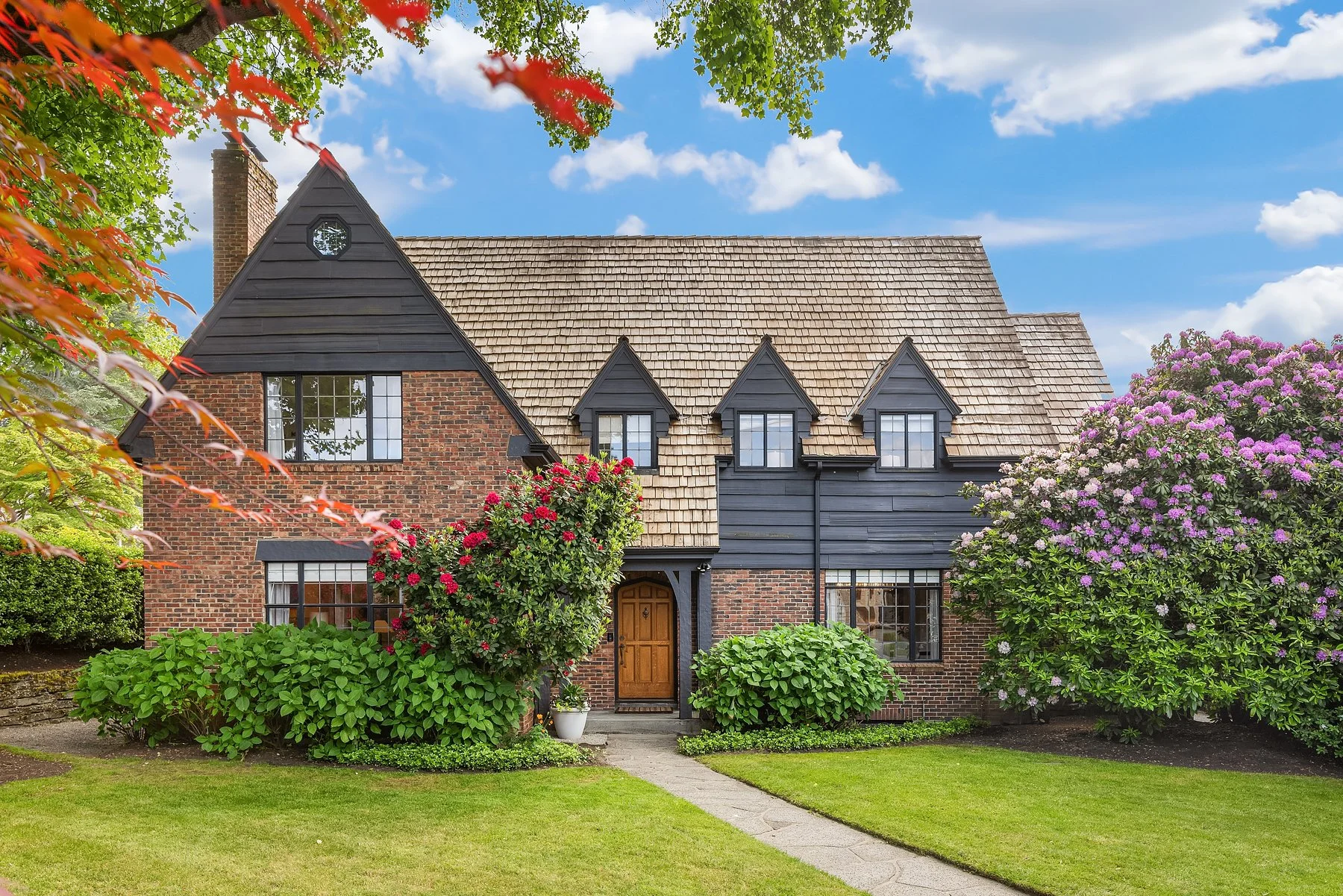 This stately Tudor isn't just a home — it's a headquarters!