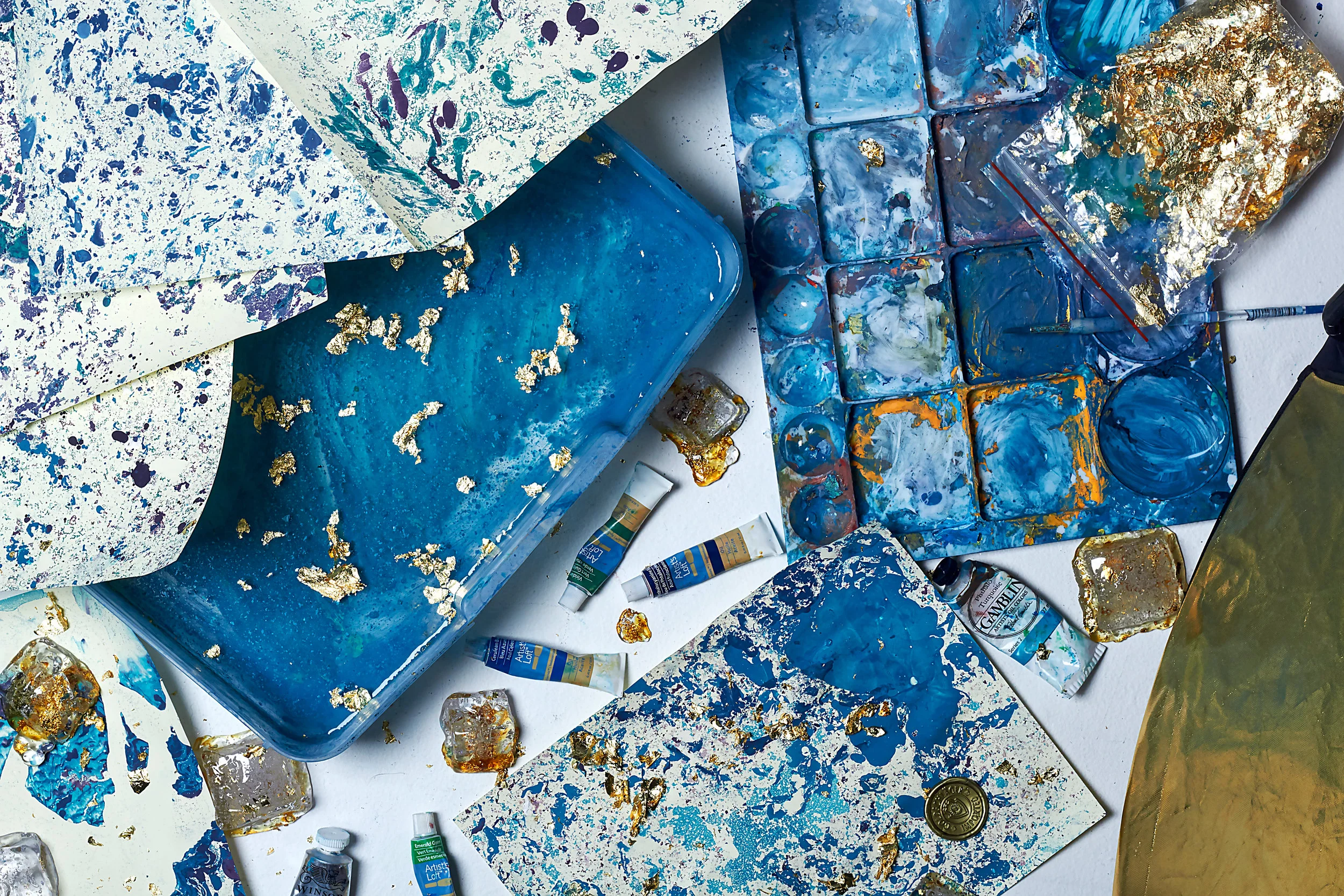 To achieve the effect shown in the print above, we used a technique called paper marbling, which is incredibly messy and mesmerizing. We also made fake ice cubes that involved melting beads and inhaling toxic fumes. 