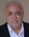 Dr. John Shévin Foster, President