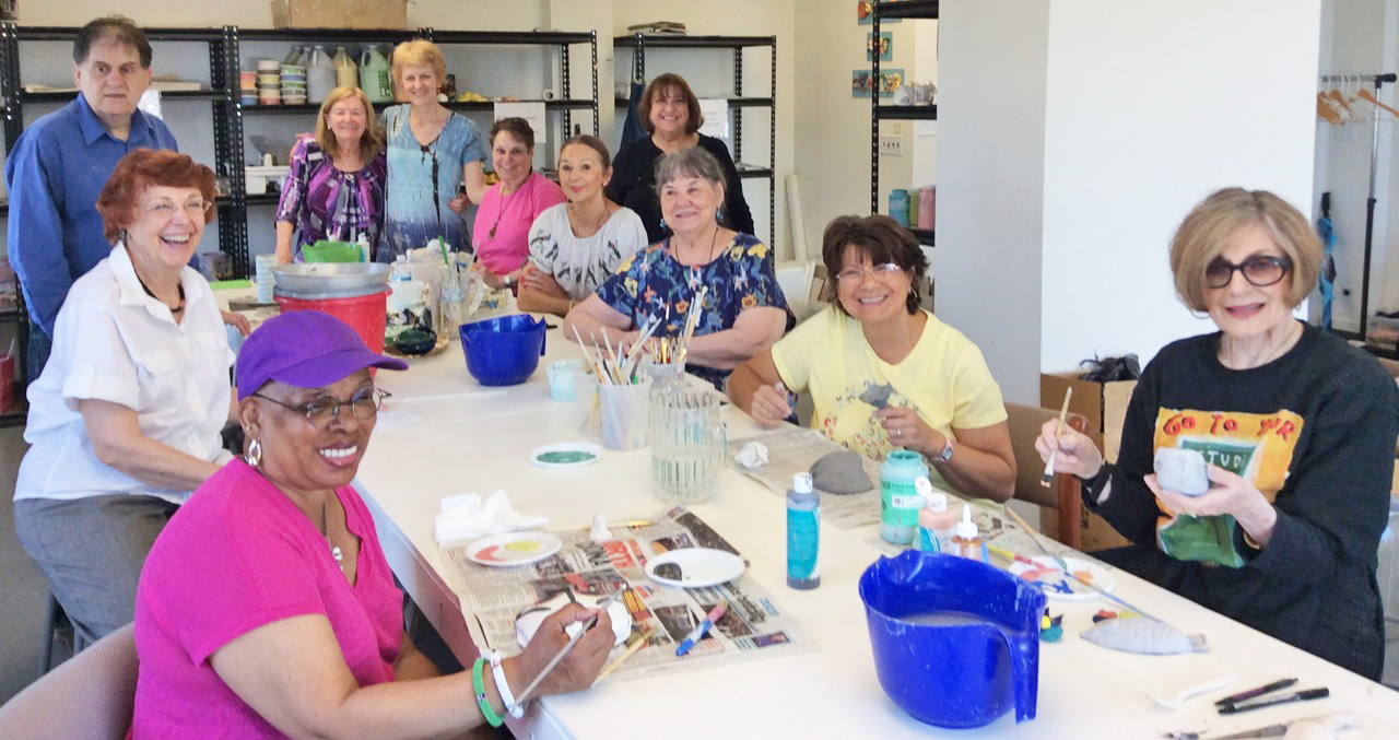 Teaching Artist Denis Licul with Clay Expressions Students