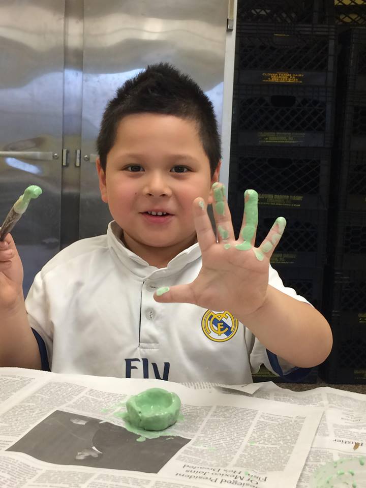 Boy with Green Glaze Hands.jpg