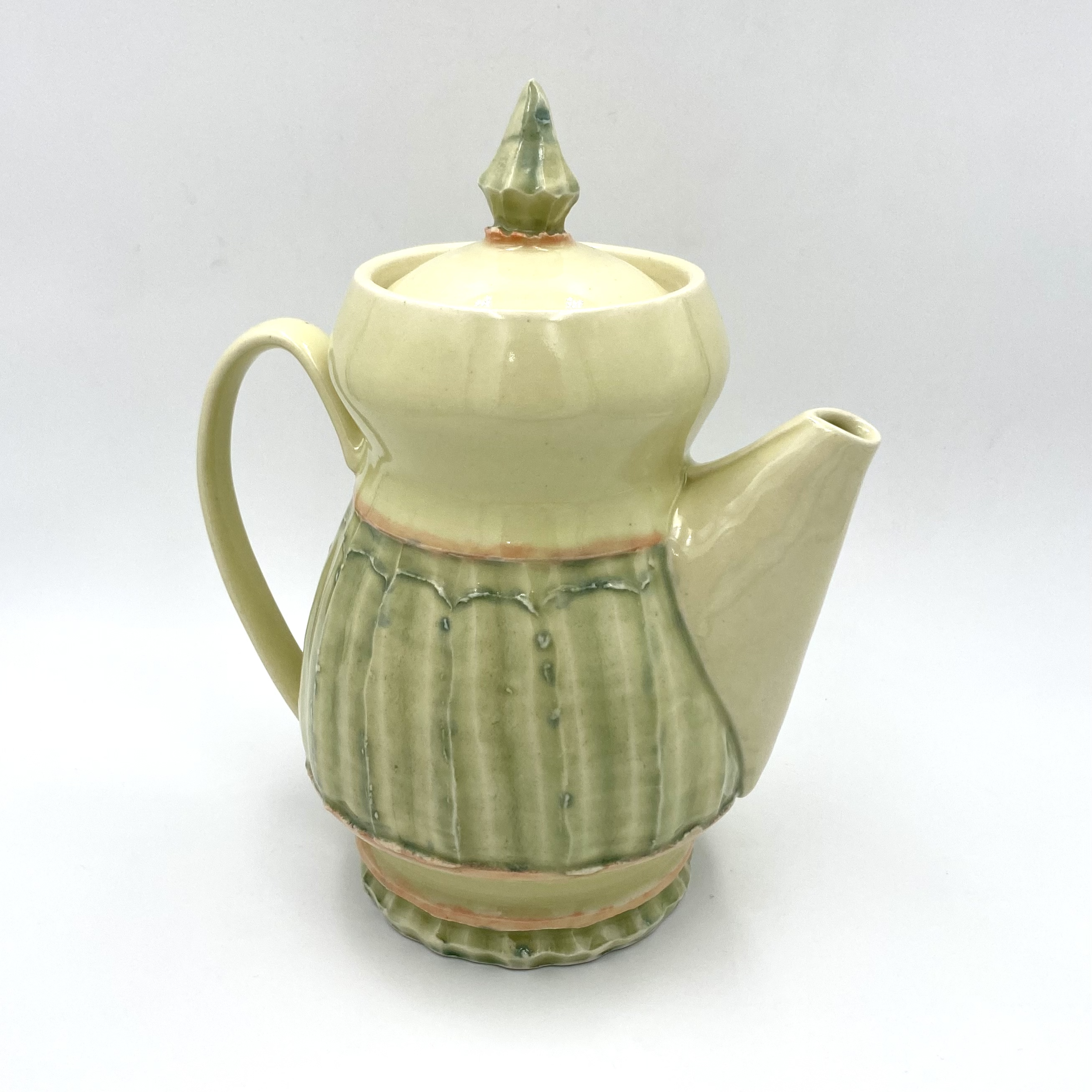 Carley's green wheel thrown and carved coffee pot