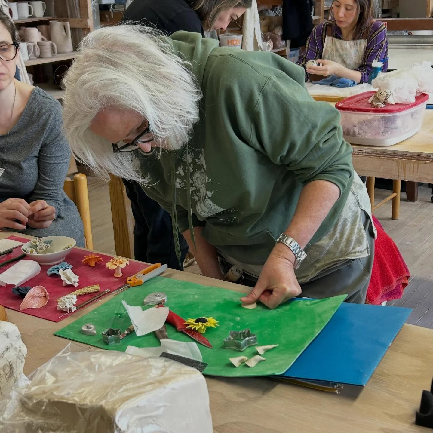 How lucky are we at Clay Art Center to have Rose Foley treat staff to a preview of this coming Sunday&rsquo;s ceramic flower making workshop? Staff enjoyed the opportunity to learn in a hands-on experience to create the most delicate floral forms. 

