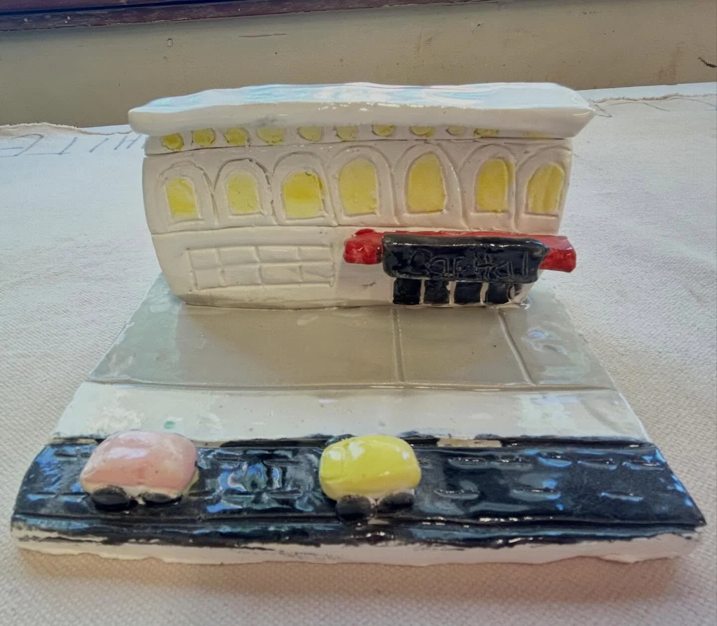 Local Landscapes as Art Inspiration! 

Elementary students in our Around the World in Clay classes at Clay Art Center made drawings of local landmarks to be included on a fence for a building under construction in Port Chester. After the students fin