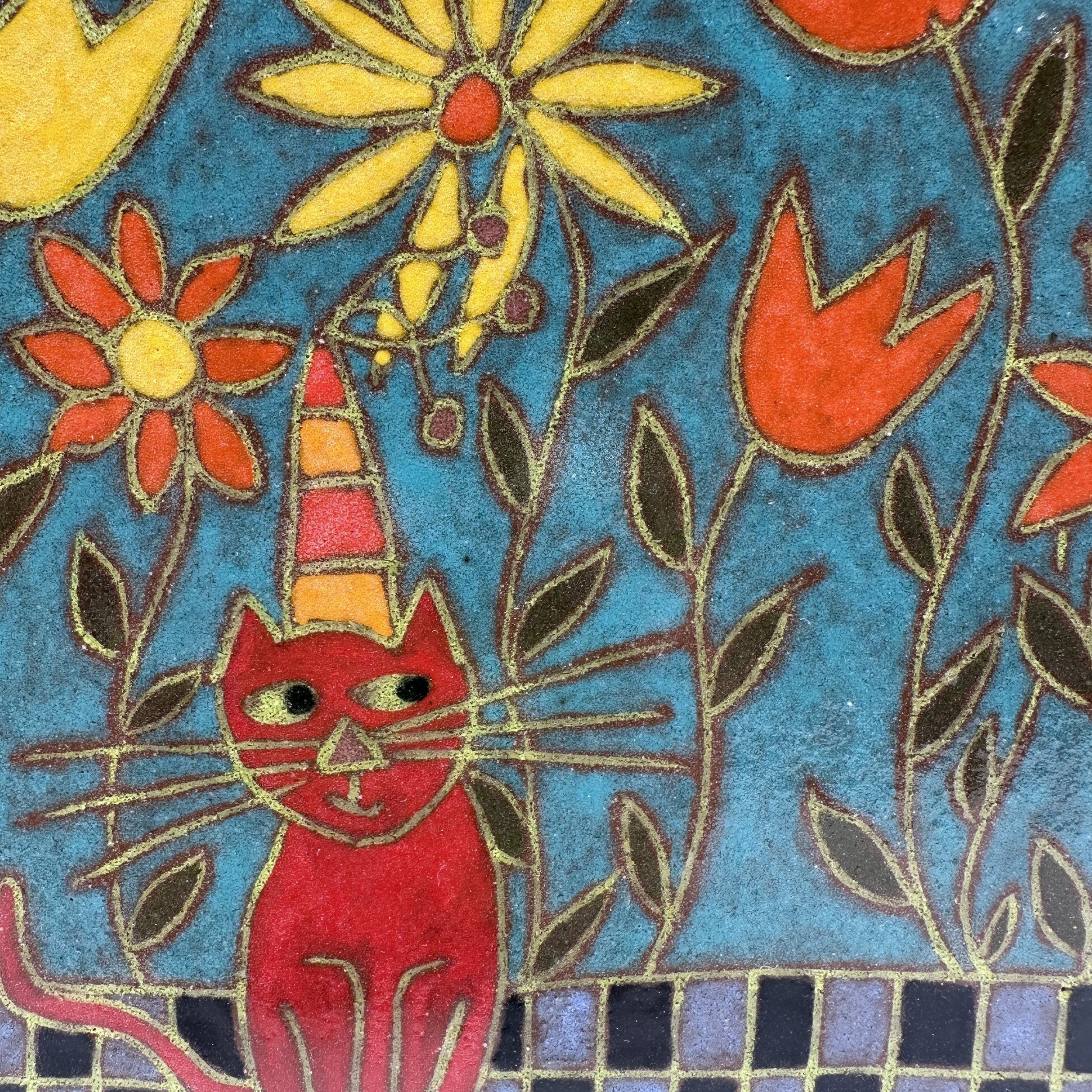 Plate Cat Sitting in Flowers close up.JPG