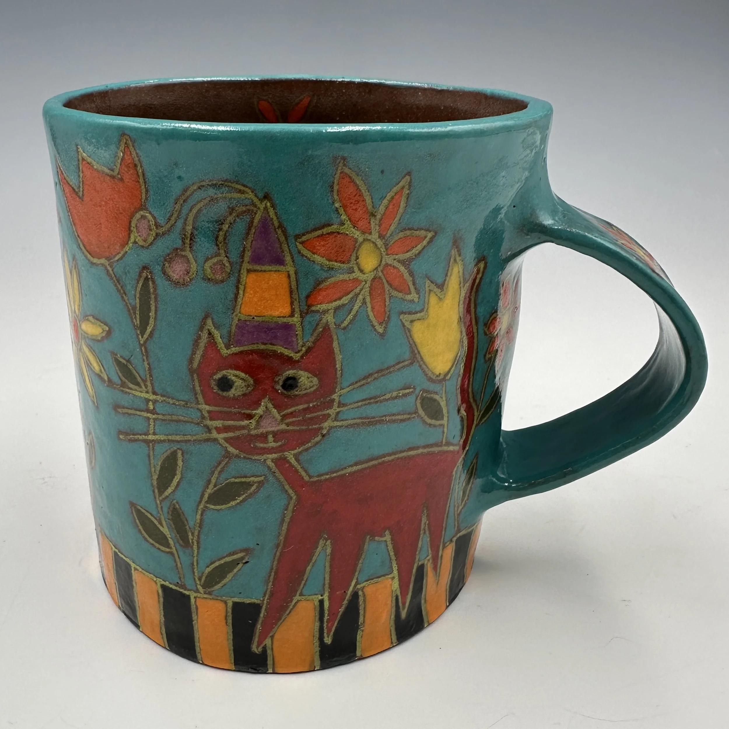 Mara Gross Cat with Purple and Orange Hat Mug