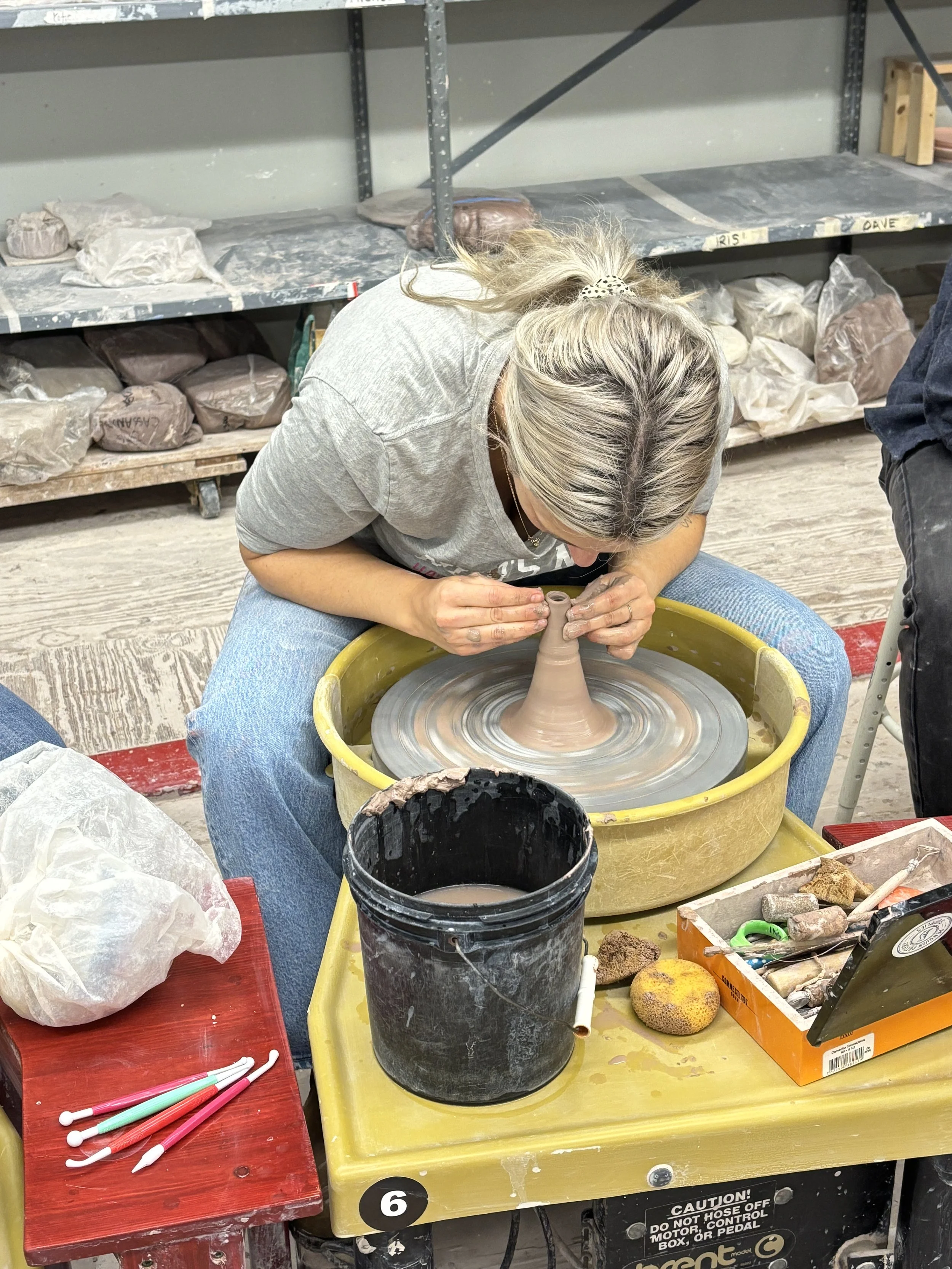 Students wheel throwing jeanne’s class-2.JPG