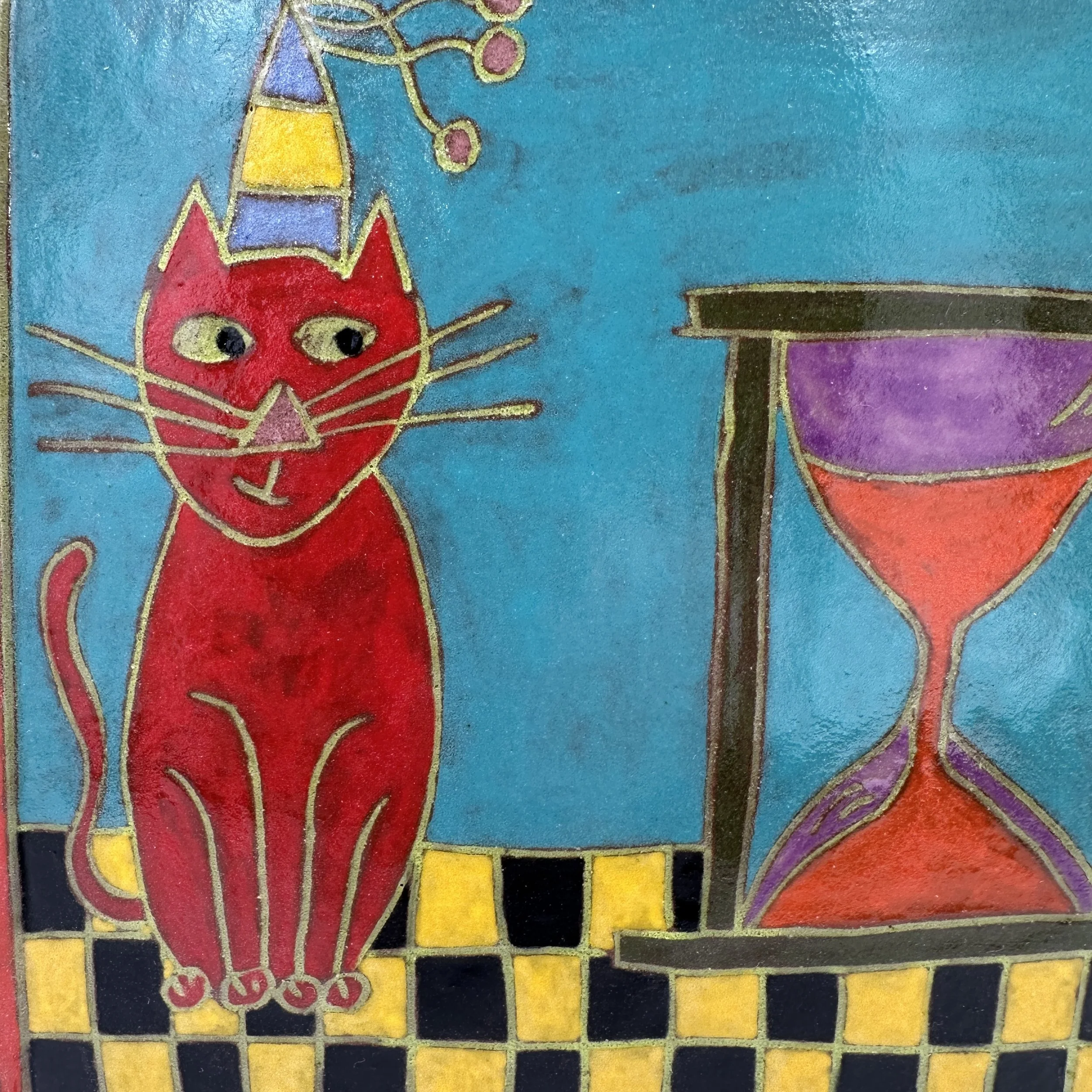 Red Cat with Hour Glass Close Up.JPG