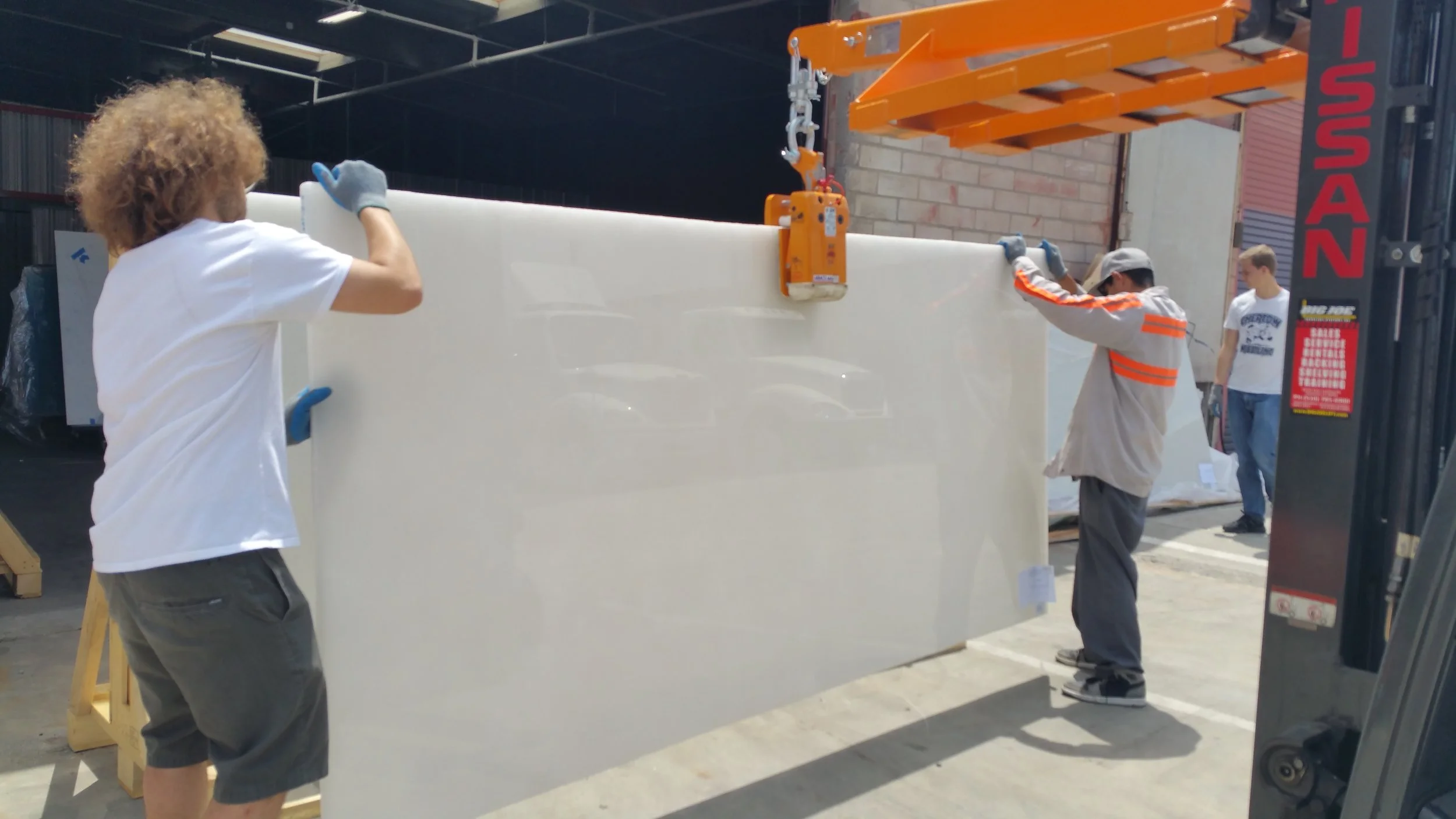 white glass slab unload.jpg