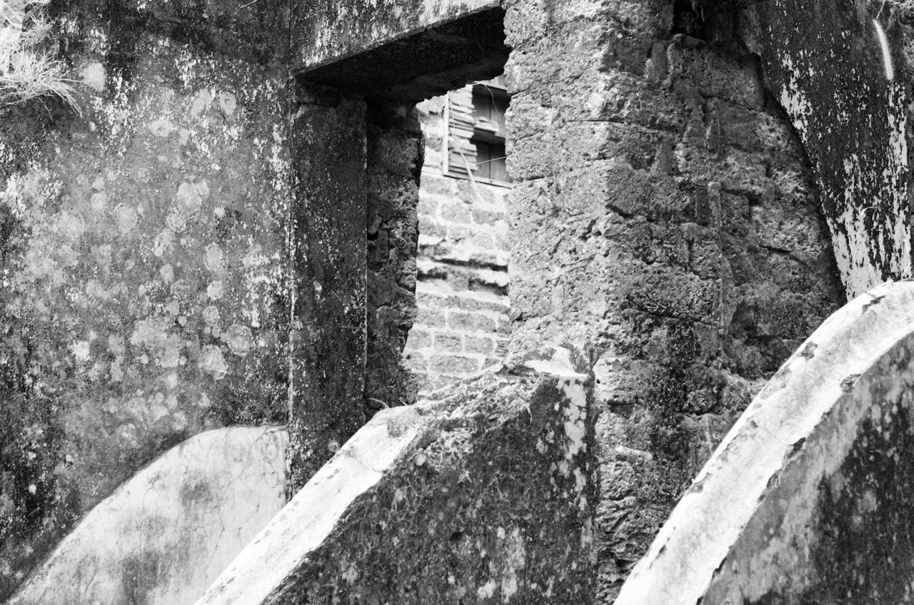 Laterite walls that once led to a jetty where many boats were harbored