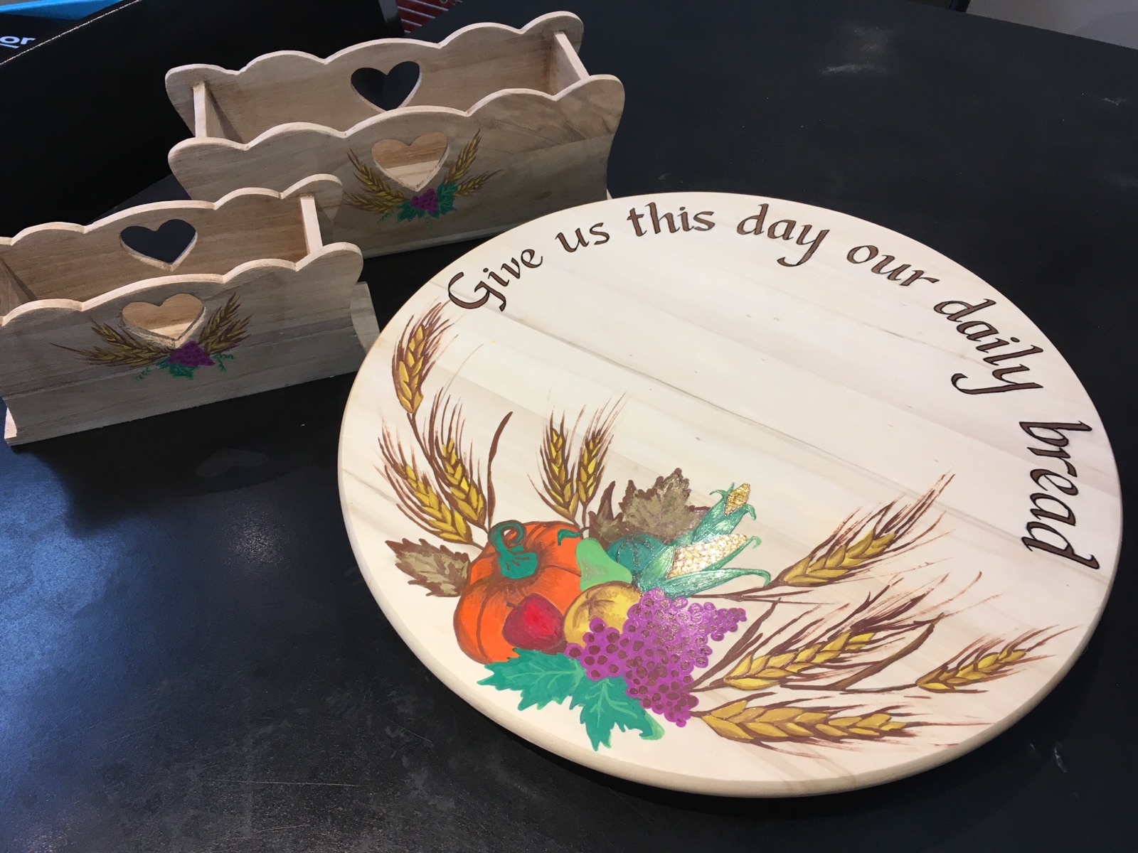 The Grade 2 class craft (pictured here, unfinished) is a hand-painted lazy Susan with accompanying napkin holder. Thanks to Tanya Lasell for her beautiful artwork and to Keely Wray for coordinating the craft. Opening Bid: $50 Bid Increments: $10 Class Code: Name, G2-(place bid)