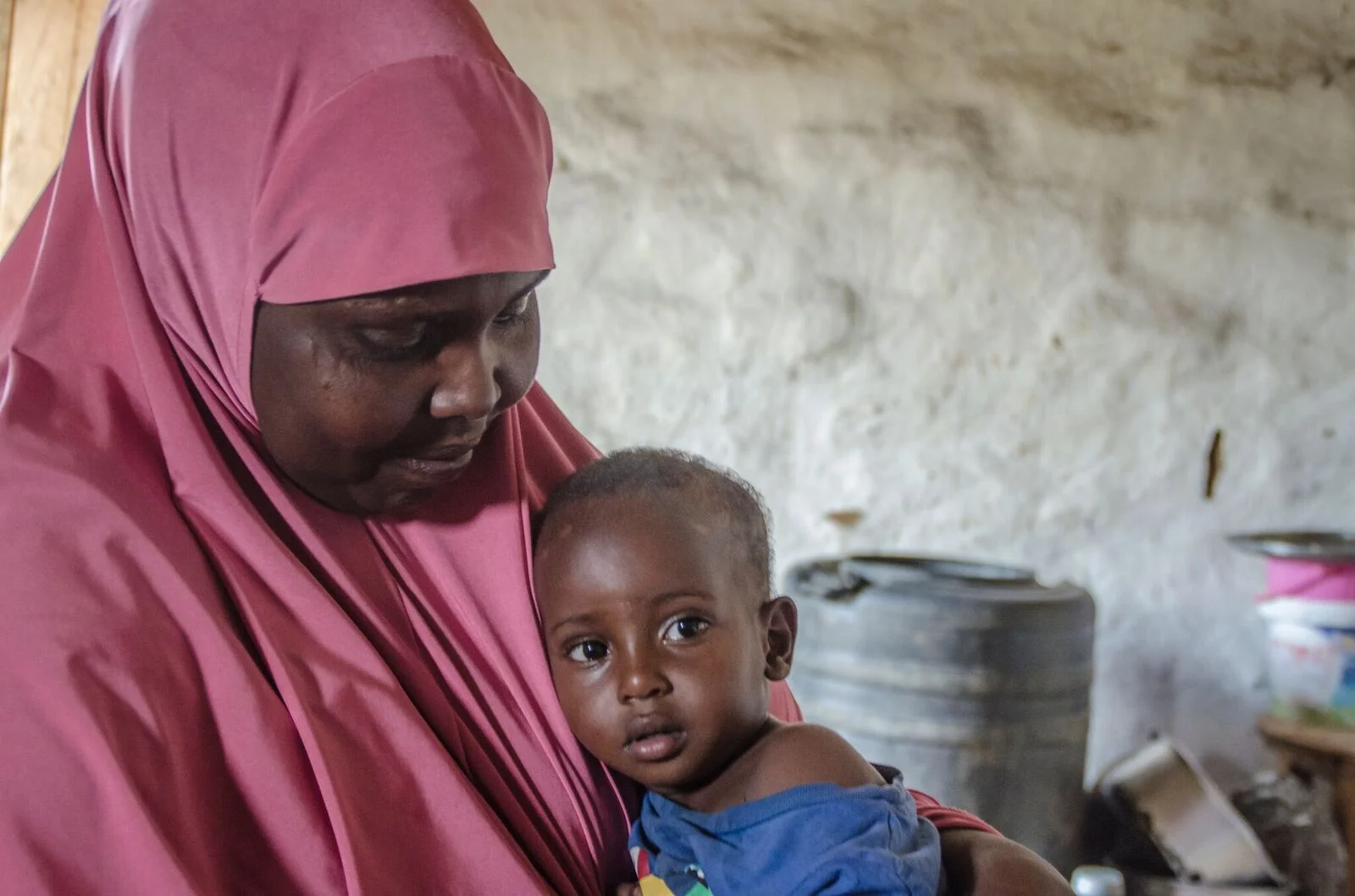 (Ayeeyo from Somalia, and her grandson, Nakivale Refugee Camp)