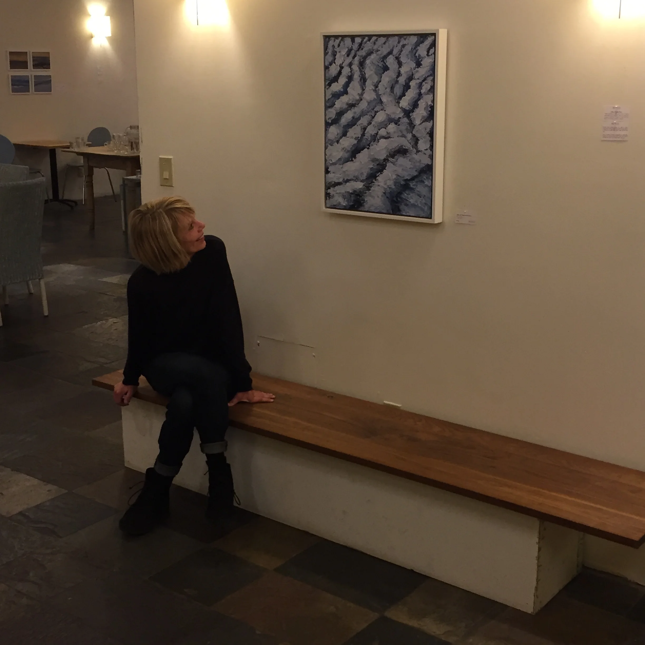 Artist Jill Abernathy taking a long look at " Above The Clouds III "