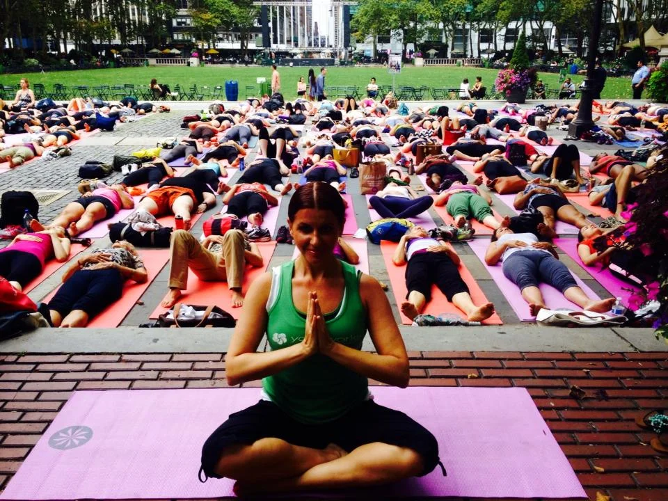 Julie teaching yogis in Bryant Park. 