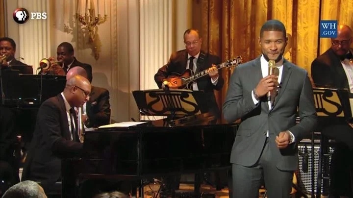 Xavier playing with Usher
