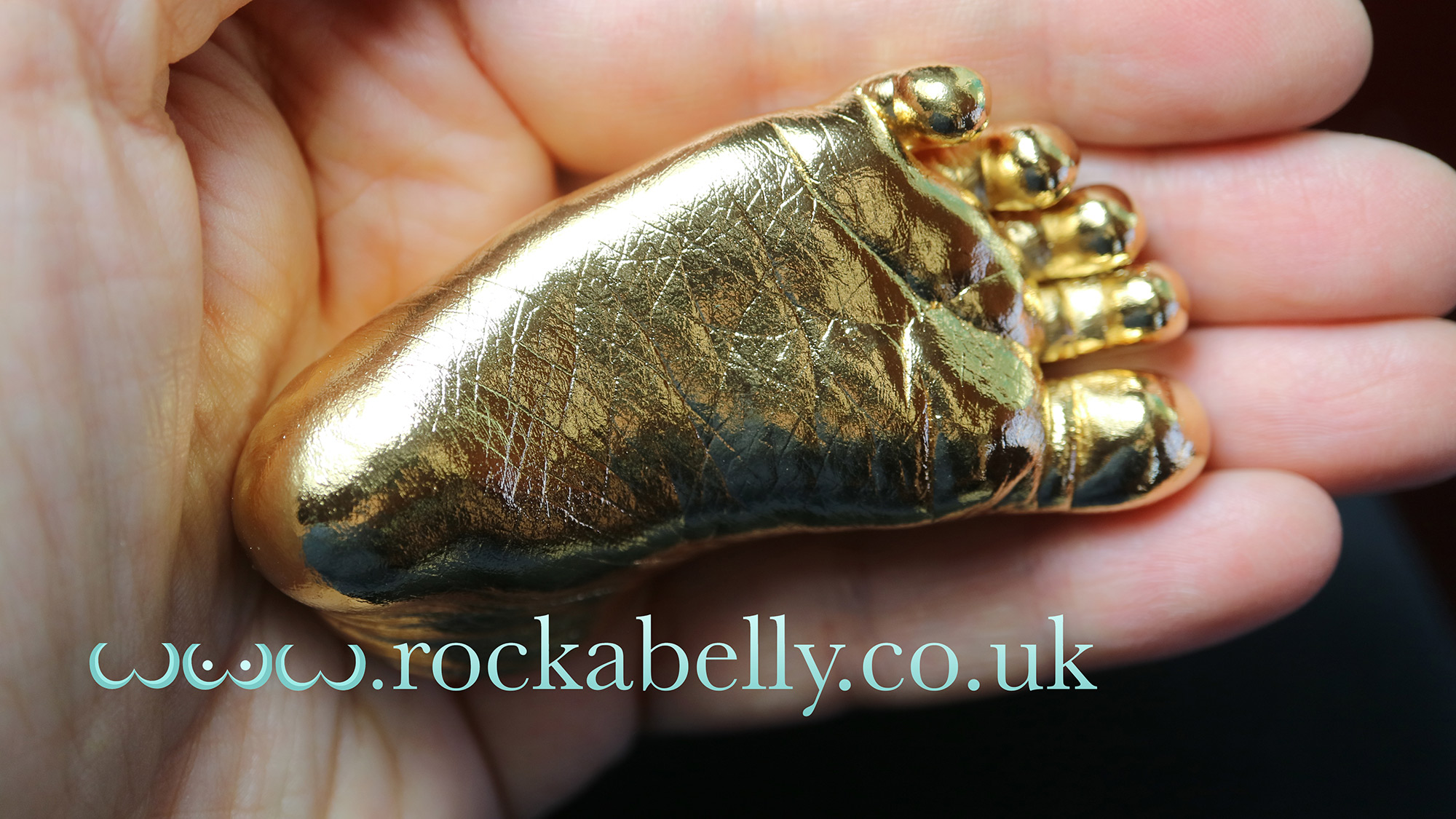 Gold baby foot cast by Rockabelly Lifecasts