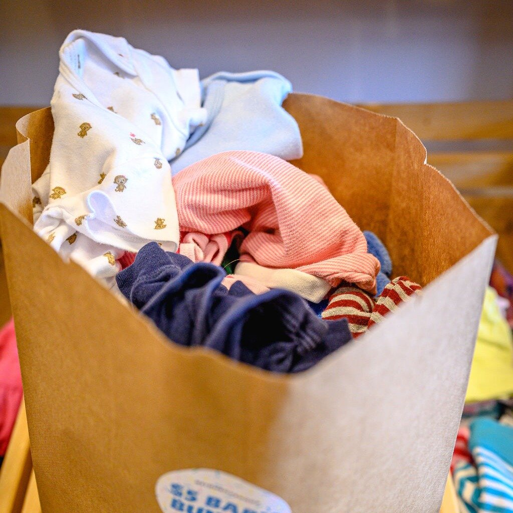Each Thursday we offer a promotion on baby and kids clothing 👀

Grab a $5 baby bundle or a $7 kids bundle. We provide the bag, and you fill it with your choice of items! 

It's just one of the many ways that we support young folks in our community ✅