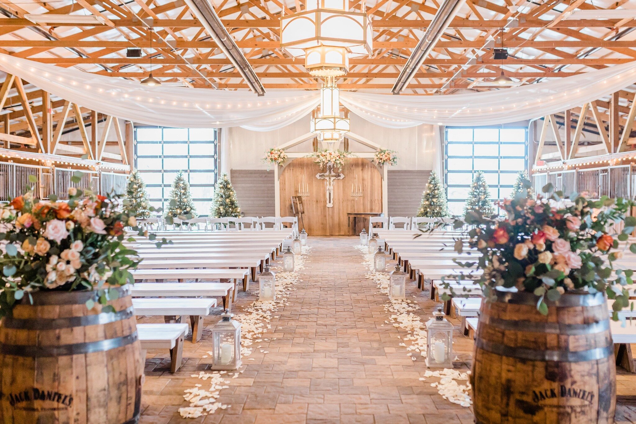 Your wedding day is a celebration of love, and at Highland Stables, we believe that it should be stress-free and effortless. That's why we offer the convenience of hosting your wedding and reception under one roof. Our stunning event space can accomm