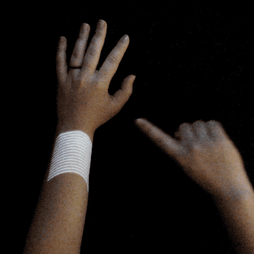 Tactum Tactum is an augmented modeling tool that lets you design 3D printed wearables directly on your body. It uses depth sensing and projection mapping to detect and display touch gestures on the skin. A person can simply touch, poke, rub, or pinch the geometry projected onto their arm to customize ready-to-print, ready-to-wear forms.