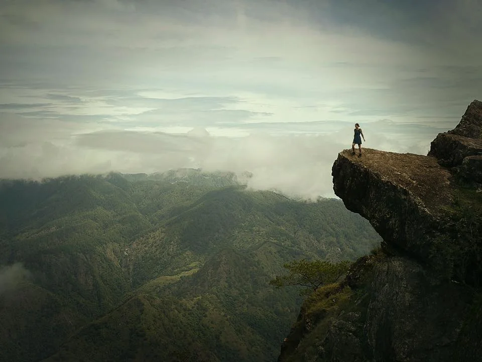 Not my best shot, but one of my favourites. It sums up the best year of my life, a year of travelling around the world to 22 countries, growing as a person, collecting incredible memories that I will take to my grave. This was shot at the top of a mountain in northern Philippines, the first mountain I've ever climbed. Reaching here I felt on top of the world. Pretty much the feeling I have had all year but in this photo this feeling is visualised. This year has been unforgettable for my life. I have learnt that I no longer need a house and possessions to be truly happy. I’d sooner collect memories then digits in my bank account. I’ve witnessed true poverty with people living with so little but with the biggest smiles on their faces and this to me has been life changing. ...The world is my playground...I have been a free spirit for this a year, I’ve never been happier. - Rebecca Lilith Bathory 