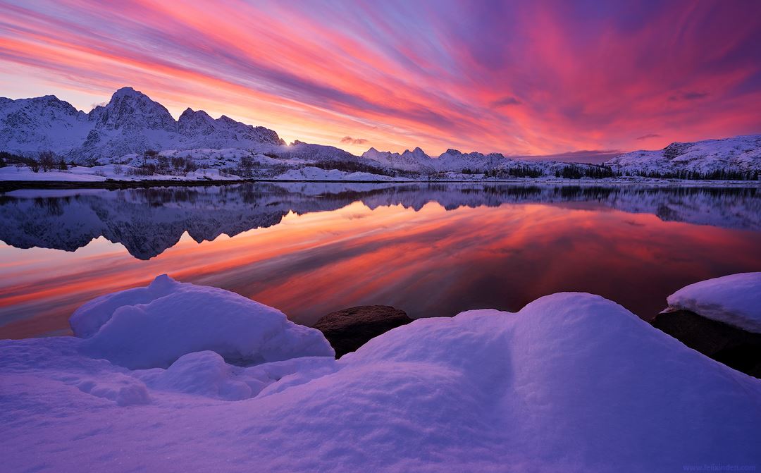 This is my favourite shot of the year for several reasons. First of all i have been craving this kind of conditions since i found this spot 3 years ago- in march the elements finally aligned and i was abled to "collect" this image i had thought about many times. Then i also love it, because it is in a region (Lofoten islands in Norway, 68°North) where many photographers gather at the hotspots, but here at this place i always have my peace of mind to be creative. Then another reason that i won´t ever forget that day: Exactly while the sun was rising and i was shooting in joy, my wife had to go to the hospital with my son due to an infection at home in Germany. All went well, but after feeling super great while shooting, i felt terrible for not beeing there to help them and beeing in the arctic instead when she called me and told me about what happened... ying and yang... - Felix Inden