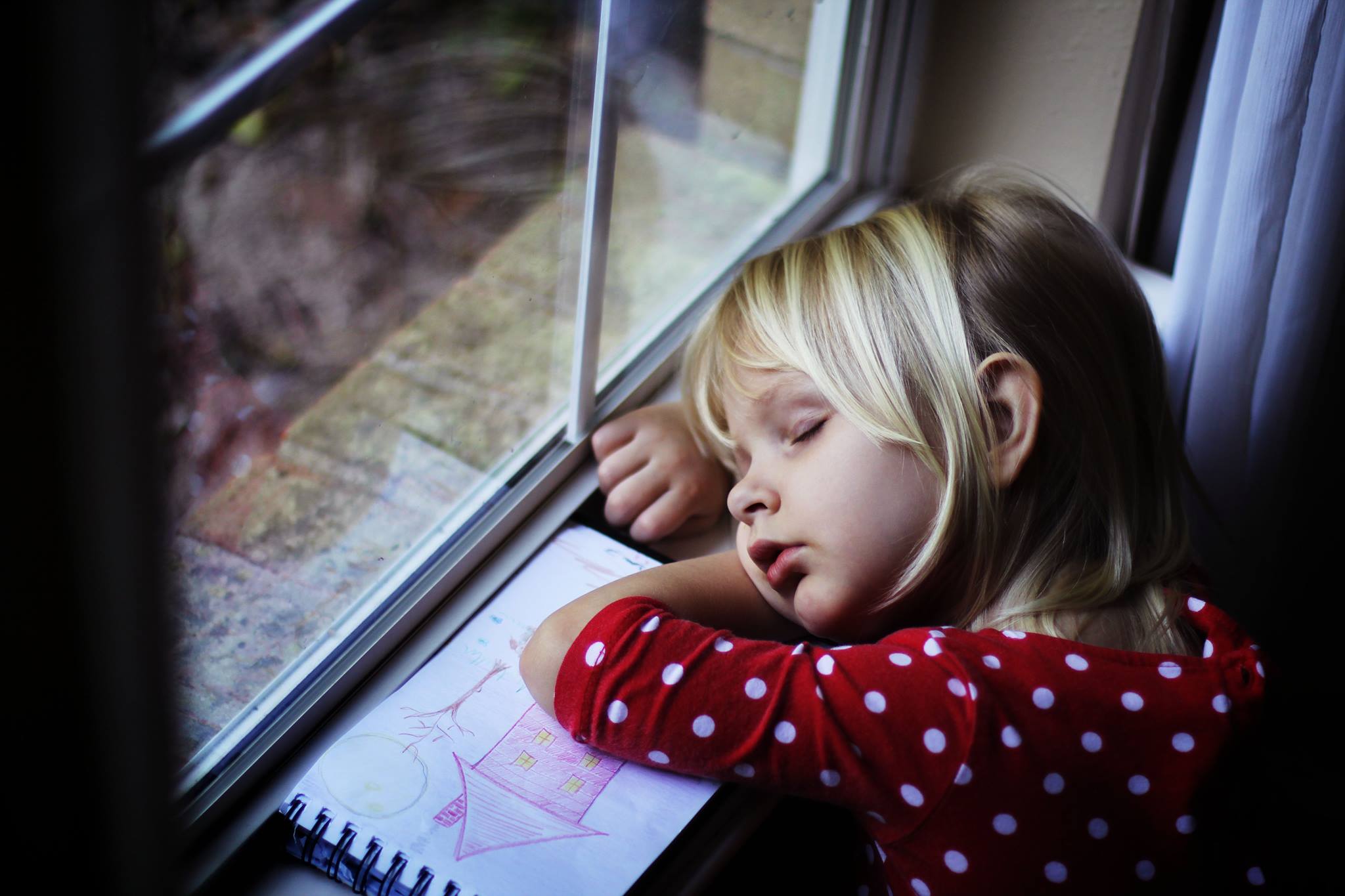 My personal favorite photo from this year is probably this simple snap of Lily from a few months back. It's obviously not the most impressive photograph, but I love that it will always remind us of a sweet moment in our day-to-day life. Lily was waiting by her playroom window for ages for Ryan to get home from work and refused to leave her post for any reason. She finally fell asleep on the window sill and was still like this when he got home. It definitely melted both of our hearts and so I'll always treasure this photo. - Tess McCoy