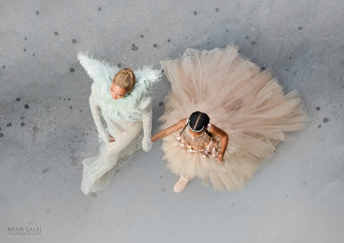  Beyonce and Blue Ivy walking into the Madison Square Garden for the MTV VMAs. Why? Because... Beyonce - Noam Galai