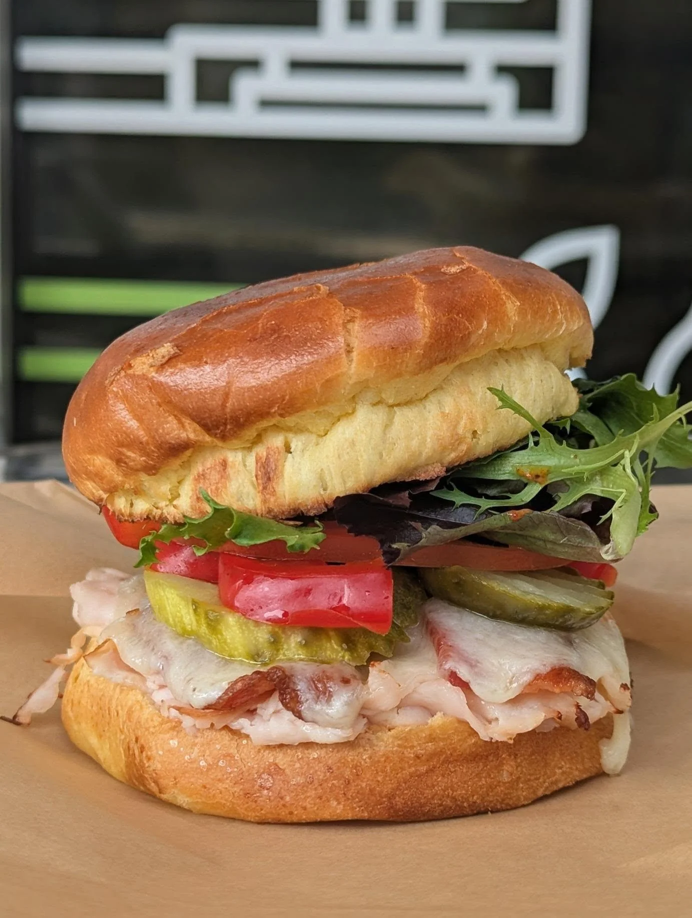 Our deli staff held a friendly competition to decide our seasonal sandwich this fall - and the winner is the Chipotle Turkey, created by Alex!
Inspired by classic Thanksgiving turkey - but not one bit dry - it comes with with spring mix, pickles, t