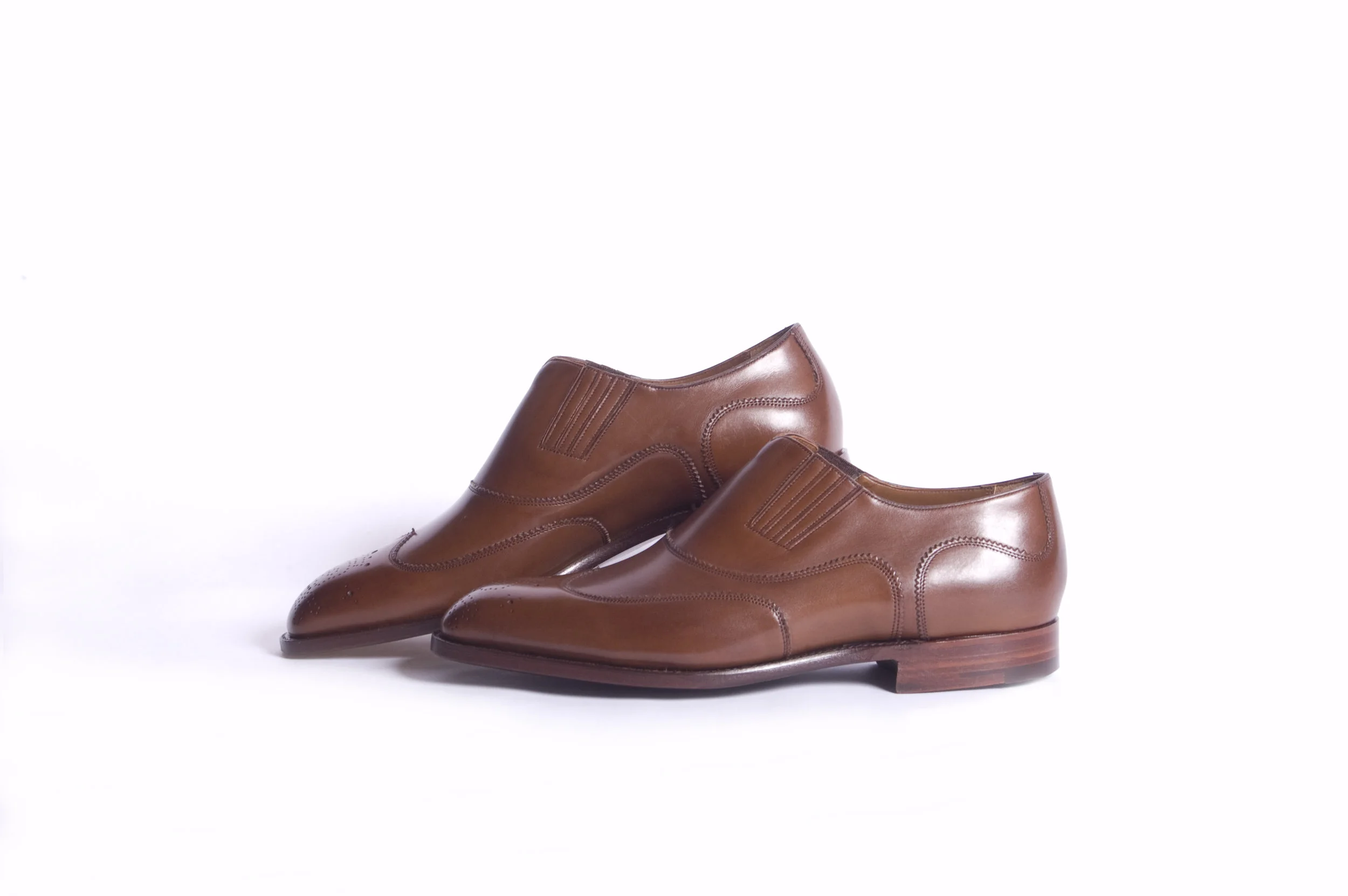 Side Gusset Slip on wingtip Brown calf on white.jpg
