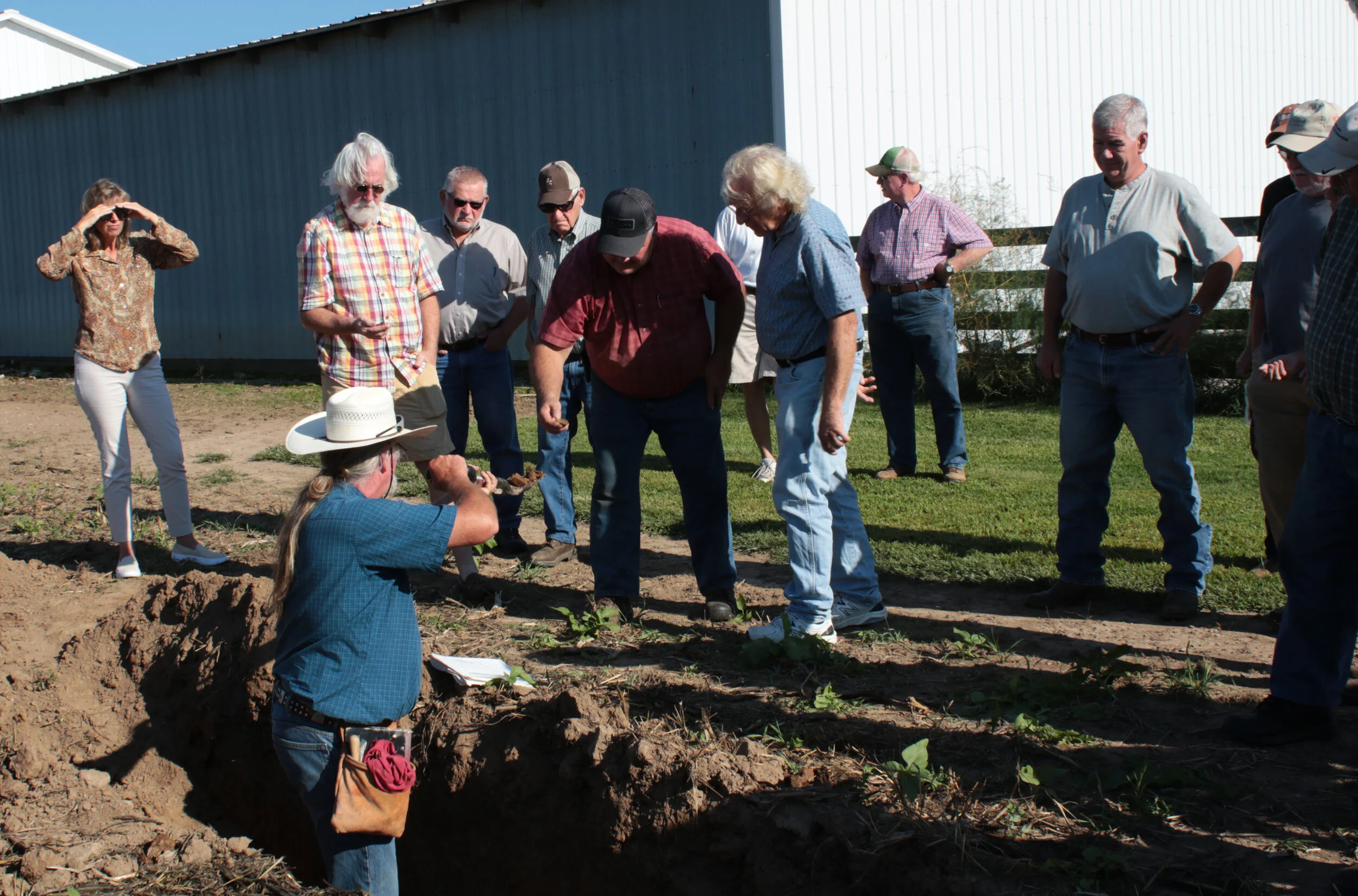 Frank Gibbs , the “Soil Guy” from Hancock County demonstrating the positive effects of worms permeating and creating a healthier soil for an optimum crop yield.