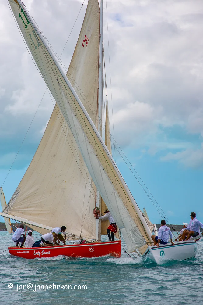 April 2019, George Town, Exuma, Bahamas, Family Island Regatta Day 1 of Championship, B Class, Lady Sonia and Ole Boy Cross Tacks (0438)