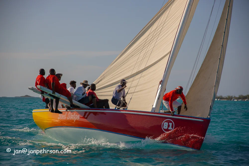 April 2019, George Town, Exuma, Bahamas, Family Island Regatta Day 2 of Championship, A Class, Red Stripe (0985)